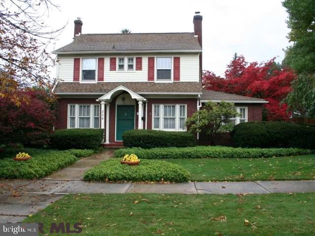 Motivated seller says make an offer! Lovingly restored classic brick two-story house located in College Heights, only 1 block from Penn State Campus and Nittany Lion Inn, and only 1-mile to Beaver Stadium, BJC and Pegula Ice Rink. This meticulously maintained home features 5 bedrooms, 4 full baths, a large eat-in kitchen with double ovens, a wood-burning insert in the living room fireplace, central air and 4-zone baseboard heat. In the basement, a spacious laundry area, stone wood-burning fireplace in the den, a soundproof recording studio and 16' by 24' storage area that could become your wine cellar. Next to the home's spacious off-street parking area, there's a large 24' by 24' two-car garage connected to the home via a breezeway that doubles as a covered porch and sits adjacent to the secluded deck located at the rear.