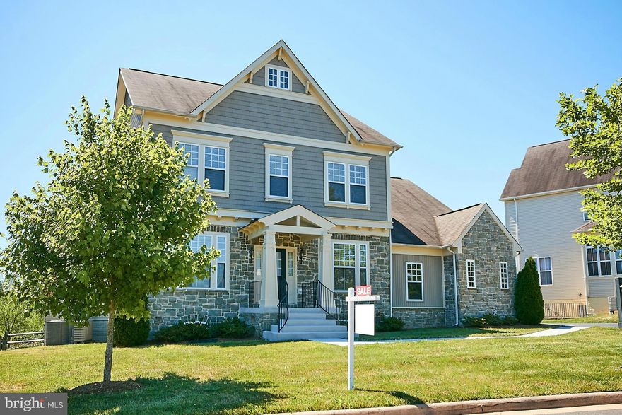 This beautiful house is almost brand new inside & out!  You will find new carpet & fresh paint thru-out! Gleaming Hardwood Floors!  Almost 3400sqft w/Bump-outs! Exterior just painted!  Large fenced rear yard backs to open common area! Master Bed w/Sitting Room! 5 Bedrms & 3 Baths Upper Level!  Quiet Street in lovely neighborhood & just a quick drive to Wegmans in Gainesville! Community Pool Avail