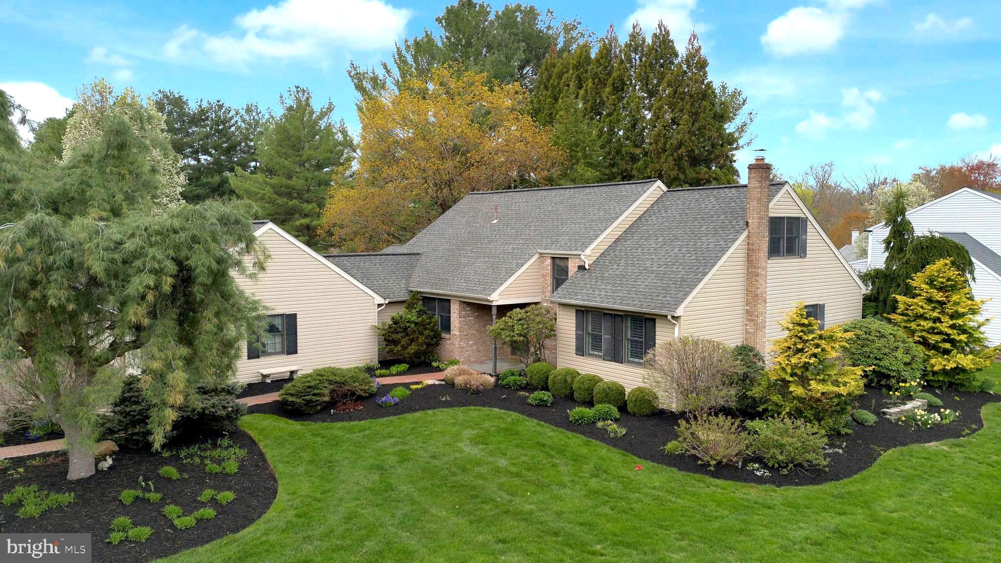 Showing Start Wednesday April 30th! Welcome to 54 John Dyer Way! Tucked into the highly sought-after neighborhood of Old Mill Estates, this lovingly maintained and sun-filled home is ready to be the setting for your next chapter—filled with festive gatherings, cozy evenings, and cherished moments. Step inside to discover a freshly painted interior and a spacious, flexible layout designed for modern living and timeless comfort- and offering a 1st Floor Primary Bedroom! Just off the main Foyer, a stunning and updated Gourmet Kitchen is a standout feature, boasting off-white cabinetry with elegant lighting accents, gleaming granite countertops, breakfast area and abundant storage. The Kitchen opens seamlessly into the bright, cathedral-ceiling Family Room, complete with a striking fireplace, skylights and French door that leads to your private backyard oasis—an expansive patio surrounded by lush gardens and mature landscaping, perfect for entertaining or peaceful retreat. The formal Dining Room is seamlessly connected to a warm and inviting Living Room—ideal for entertaining guests, holiday celebrations or unwinding with your favorite book. A hallway leads to the main-level Primary Bedroom, which features 2 walk-in closets with built-ins and direct access to a sumptuous full bath with a luxurious walk-in shower and double-sink vanity. A second Bedroom with custom built-ins and hardwood floors makes an excellent guest space or home office. Upstairs, you’ll find two more charming Bedrooms and a nice-sized second Full Bath with skylight, offering space and comfort for everyone. The lower level adds incredible versatility and space for a game room, home gym, or hobby area—complete with built-in wine fridge and fantastic storage for every season. Located just minutes from the heart of Doylestown with easy access to shopping, dining, parks, and more, this home is also located in the award-winning Central Bucks School District and features a 3-Car Garage! Don’t miss your opportunity to own this special home in an unbeatable setting—schedule your showing today!!