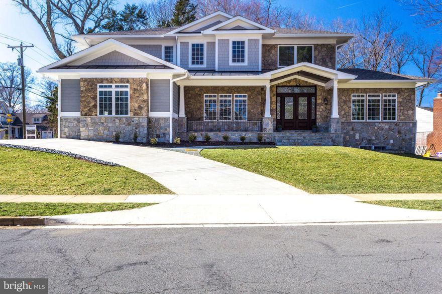 Huge Price drop!State-of-the-art construction in Langley Pyramid. Hardi/stone exterior, 2-story grand foyer, wide staircase. DELUXE trim work throughout, oak HW floor on 2-levels. GOURMET kitchen w/ THERMADORE appliances. ELEVATOR SHAFT. OPULENT owners suite with HEATED bathroom floors. CIRCULAR driveway. LL w/media, rec & fitness rooms & bar. Attached 3 -car garage.