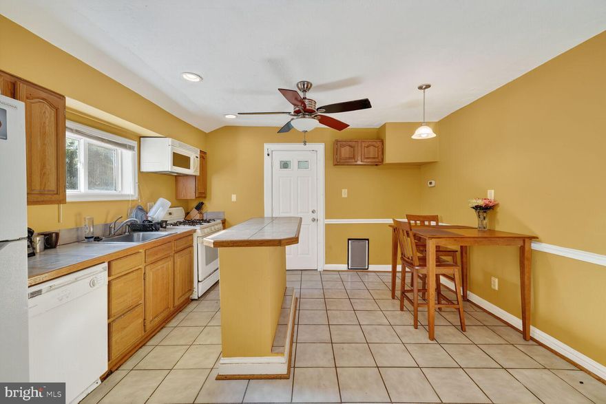 Comfortable and Cozy Rambler with Three Bedrooms and One Full Bath. Home has spacious kitchen with Kitchen Island and Eat-In Area. Great access to Large Living Room with TV that can convey with purchase. Home has newer washer and dryer and a new roof. Private Fenced-In Backyard, which is great for entertainment. Close to Metrobus and Easy Access to DC, I-95