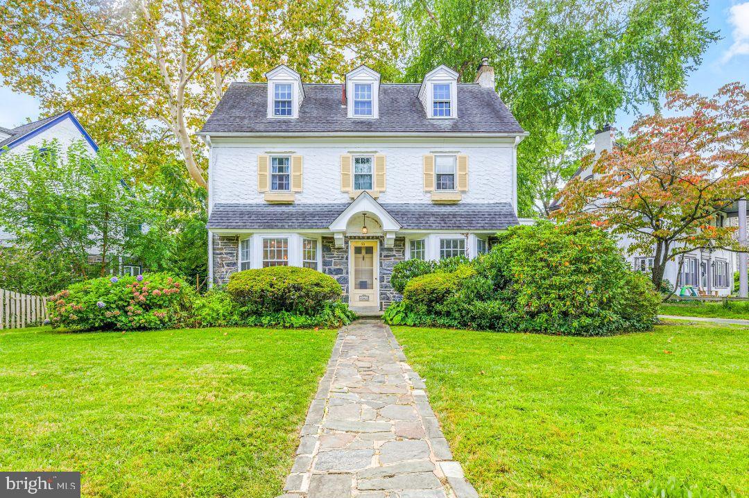 Welcome to this charming, beautifully updated 5-bedroom, 2.5-bath stone Colonial tucked away on a quiet, sidewalk and tree-lined street in the award-winning Lower Merion School District. This home blends timeless character with thoughtful modern designs, perfect for both everyday living and entertaining.
Step inside to find a bright and inviting floor plan! The spacious kitchen / dining area was fully remodeled (2022) featuring a farmhouse sink, quartz counters, stainless steel appliances, gas cooking and an oversized island! The living room with a stone wood-burning fireplace and gleaming hardwood floors offers the ideal setting for gatherings both large and small. The inviting, covered side porch extends your living space outdoors, adds timeless curb appeal and is perfect for relaxing in the fresh air.
Upstairs, the primary suite is a serene retreat with a large walk-in closet and updated en suite bath. Two additional bedrooms on the second level share a beautifully remodeled hall bath (2018). The top floor offers two more bedrooms, perfect for family, guests, or hobbies.
The finished basement (2022) with added half bath adds valuable living space—great for a gym, media room, or playroom—supported by a French drain and sump pump system (2021) for peace of mind.
Outside, in addition to the porch, you'll find a fully fenced yard, spacious deck and beautifully landscaped gardens—perfect for outdoor entertaining or quiet relaxation. A large detached garage and paved driveway provide ample parking and storage.
With its ideal location close to parks, shopping, dining, and transportation, this charming colonial offers the perfect combination of classic Main Line appeal and modern comfort.