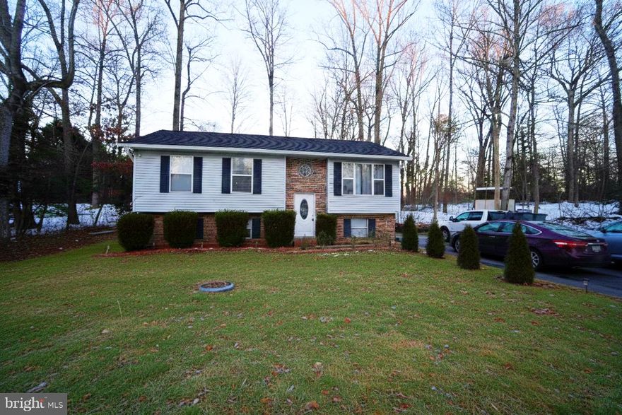 A home within an affordable price. Located in Chesapeake Ranch Estates, with water access & beach. This split foyer had large back yard with deck, plenty of parking as needed and 5 BRs w/ 3 bathrooms. Close to schools, shopping and restaurants and more. The property is SOLD AS IS.