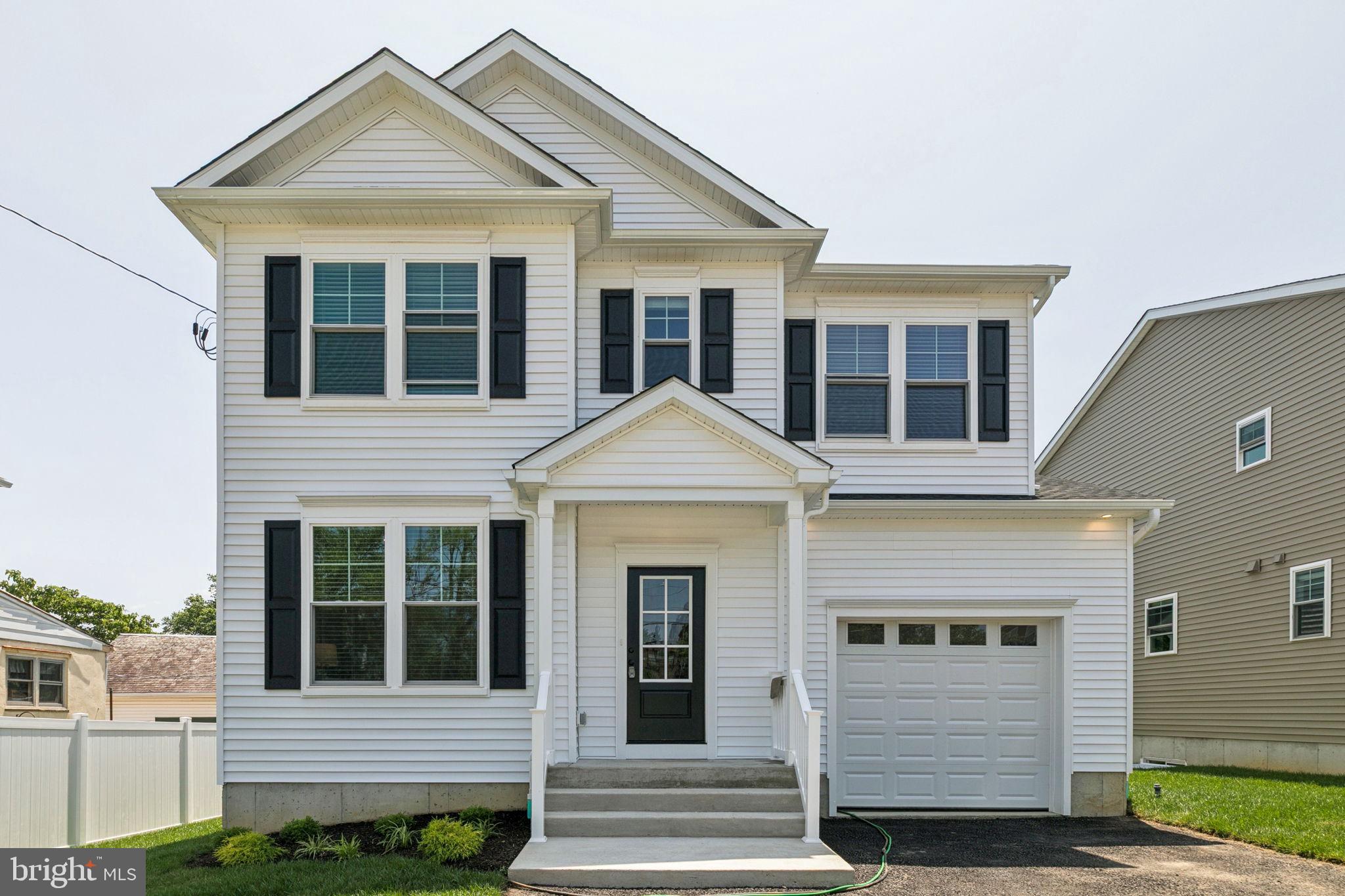 Brand-New Construction in Wyndmoor – Ready for Summer Entertaining! Welcome to this stunning new build in the sought-after Springfield School District. Perfectly positioned near local favorites—including bars, restaurants, a neighborhood market, a juice and smoothie bar, and the charming Mermaid Park—this home offers a vibrant lifestyle just minutes from Chestnut Hill, without crossing into Philadelphia. Inside, you'll find a thoughtfully designed open floor plan with gleaming hardwood floors throughout. The chef-inspired kitchen is the heart of the home, ideal for hosting and entertaining. A dedicated office/flex room provides the versatility to suit your needs. The spacious primary suite boasts cathedral ceilings and three generous closets, creating the ultimate retreat. Step outside to a fully landscaped yard and unwind or entertain on the low-maintenance TREX deck, just in time for summer gatherings. Don't miss the opportunity to own this move-in-ready gem in a prime location!