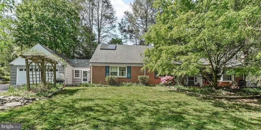 Welcome to 343 Michigan Avenue, where tranquility and privacy meet the charm of a classic Cape Cod home. Perfectly placed at the end of an idyllic cul-de-sac and nestled on nearly an acre of serene landscape, this delightful property invites you to experience the best of first-floor living. 
With four bedrooms and two and a half bathrooms, this home is perfect for anyone looking for a peaceful retreat and flexible living options. Just off the charming brick patio, step inside to find a welcoming foyer. To your left is one of the bedrooms, currently used as an office. To the right, you will find the expansive living room, accentuated by a charming fireplace, large corner built-in and picture window overlooking the beautiful and spacious yard. There is also access to the lovely screened in porch, perfect place for coffee and enjoying the lovely surroundings. The first-floor primary suite features a newly updated spacious en-suite bathroom and a large walk-in closet. A formal dining room with a large picture window, updated and expansive eat-in kitchen with bar area, 2-car garage, breezeway with laundry and mudroom complete the first floor. Upstairs, you will find a spacious landing area, perfect for a play space or reading nook, two large bedrooms, a hall bath, and abundant closet space. The spacious basement offers endless possibilities as a home gym, workshop, or additional living space or storage. Outdoors, the expansive lot provides ample space for gardening, relaxation, or even hosting friends and family. Surrounded by nature, you'll enjoy the ultimate in privacy with plenty of room to breathe. 
Whether you're lounging by the fireplace or enjoying the lush greenery outside, 343 Michigan Avenue offers a tranquil lifestyle, just waiting for you to make it your own. Embrace the casual elegance and comfort this home presents—schedule your visit today and fall in love with your new haven.