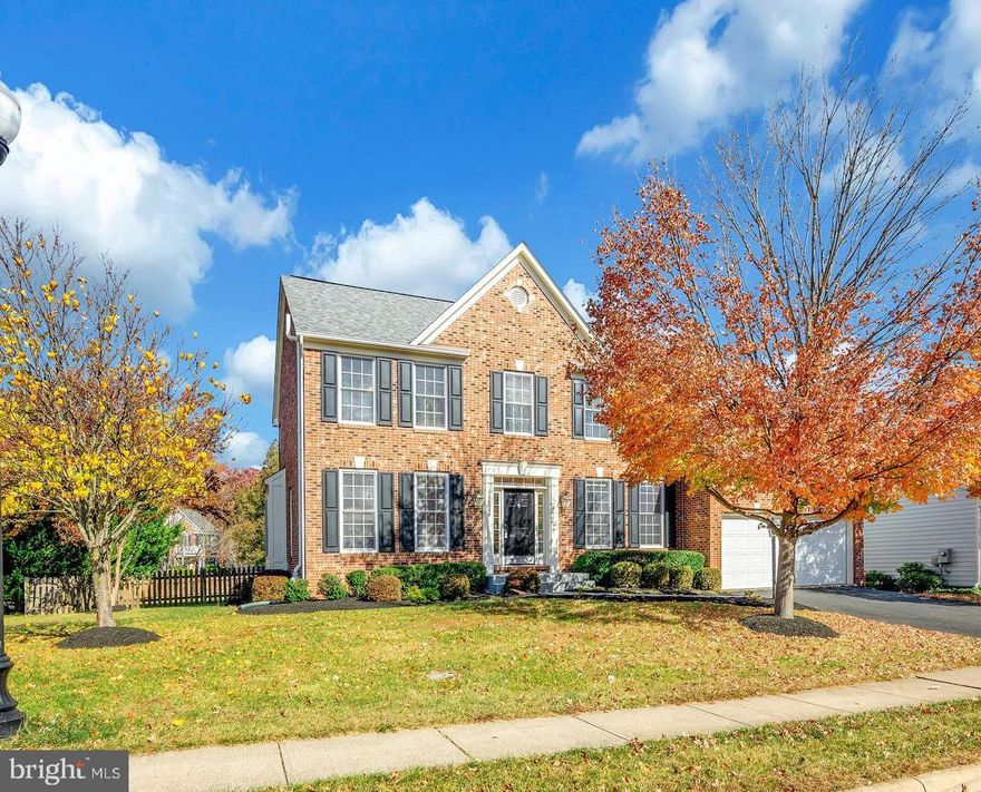 Great opportunity to own this Beautiful Brick Colonial 4 bedrooms, 3.5 bath home with total square feet of 3,736. Welcome to this beautifully maintained brick-front home, Oxford Model in the highly desirable Glenkirk Estates, offering fantastic curb appeal and an array of recent upgrades. Located just minutes from the vibrant Virginia Gateway, enjoy easy access to shopping, dining, and entertainment options including a movie theater. This home features three finished levels with elegant hardwood floors throughout home. The spacious updated kitchen boasts sleek granite countertops, stainless steel appliances, and new cabinets with open floor plan into family room filled with natural light and a cozy fireplace. The fully finished lower level offers even more space for living and entertaining with a large rec area, bonus room, and full bath. The fenced backyard is an ideal retreat, complete with a stone patio, sprinkler system, and well-maintained landscaping. Recent upgrades include roof and washer and dryer and kitchen. Low HOA payments! This home is move-in ready and waiting for its new owners!  Disclaimer: All information provided is deemed reliable but is not guaranteed and should be independently verified. The listing is subject to errors, omissions, changes in price. Measurements, square footage, and other property details are approximate and should be verified by the buyer or buyer's agent. No warranties or representations, express or implied, are made as to the accuracy of the information contained herein. Don't miss your opportunity to own in this sought-after community.