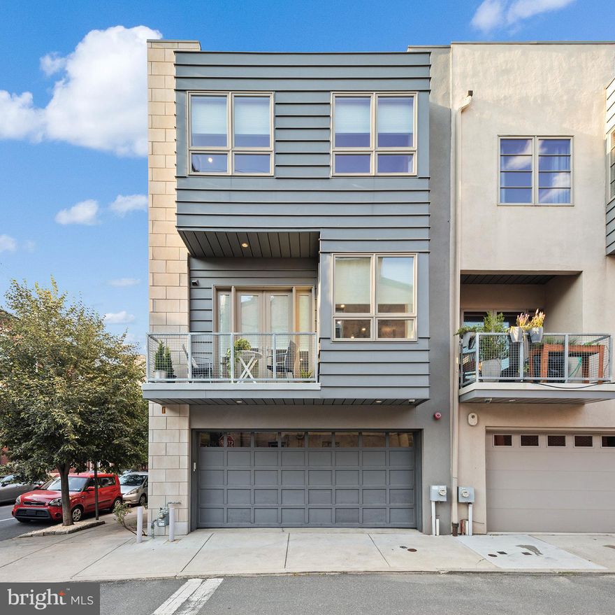 Stunning, 2013 build home with and all the bells and whistles you would expect of a luxury builder’s own home– five-story extra wide contemporary home with light and air on three sides, oversized two-car garage, panoramic city view roof deck. Enjoy three luxurious en suite bedrooms; one located on the ground floor which is perfect for in-laws or office conversion. Primary  Bathroom includes soaking tubs, immense steam shower, custom tiling, quartz counters and vanities, and wall-mounted Toto toilets. The sleek designer gourmet kitchen presents Italian cabinetry, Miele, Wolfe, and Subzero appliances, including built-in coffee/espresso, convection oven, with steam oven, induction cooktop surfaces, and two wine coolers.  The open area floor plan features Italian marble floors, a sleek powder room, an in-wall corner gas-fire place,  and an outdoor deck with French doors. This living and kitchen area is an entertainer's dream and is flooded with natural light throughout. Designed for modern living, the full-size laundry room is upstairs, while the fully finished lower level is currently configured for the gym, playroom, and family living center with tons of storgae space! Details too numerous to mention, include multizone HVAC,  mocha hardwood floor, heated floor tiles, custom California closets, Pella windows and doors, recessed LED lighting, security and intercom system, electric car charger, and so much more.  Located in one of the City’s hottest neighborhoods, steps to everywhere, this unique home is a MUST SEE now.  Real estate tax abatement through 2025.