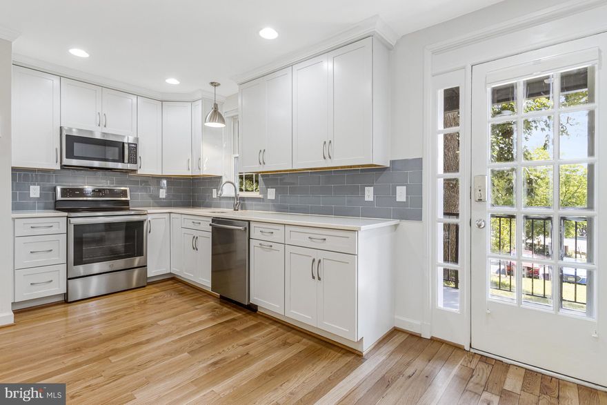 Beautifully renovated unit with over 1,490 sq. ft. of versatile living space! Enjoy an open main-level floorplan and a spacious primary suite with walk-in closet, then head downstairs to a fantastic lower level complete with den, full bath, laundry room, and family/guest room (flexible space) with private entrance.  Modern upgrades include quartz counters, stainless steel appliances, refinished hardwoods, remodeled baths, recessed lighting throughout, and two spacious walk-in closets. Relax on your private balcony, surrounded by mature trees in the historic and vibrant community of Fairlington Villages.  Amenities include pool, tennis, tot-lot, and community center. Unbeatable location near Bradley Shopping Center, Shirlington, and major commuter routes. Available immediately. Pets considered case by case with additional deposit and rent. 24 month lease preferred.   TV rack in LR can be removed.