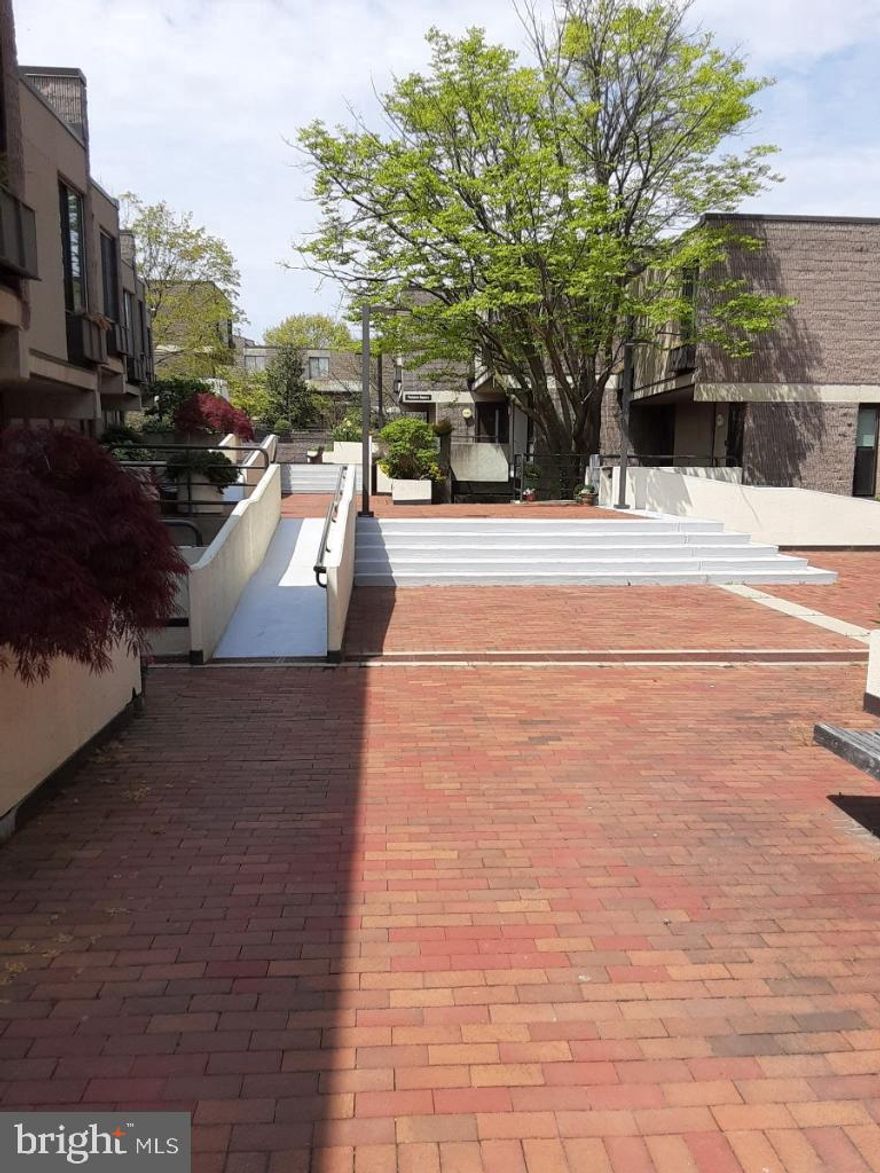 Contemporary four-level condo in the heart of Baltimore City offering stylish urban living with exceptional amenities. This spacious residence features 3 bedrooms and 2 baths, an updated gourmet kitchen with luxury appliances, and an open, light-filled layout perfect for modern living and entertaining. Enjoy private outdoor space in the secluded courtyard, ideal for relaxing or dining al fresco. Garage parking for one car adds convenience, while the charming brick courtyard entrance creates a welcoming first impression. Community amenities include a pool for summer enjoyment. A rare combination of contemporary design, private outdoor living, and city convenience.