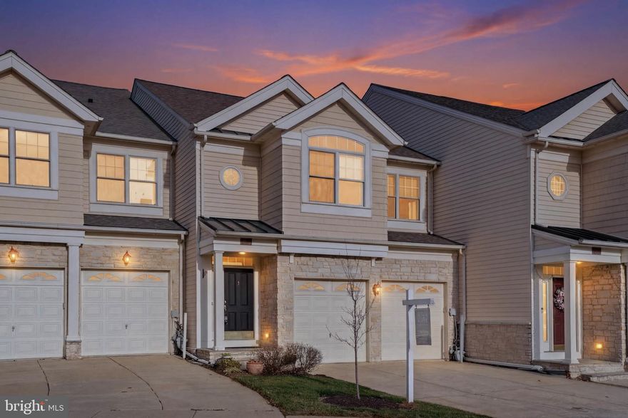 Welcome to 8704 Timber Oak Ln in Laurel, MD—an elegant Colonial-style townhouse offering 3,936 square feet of thoughtfully designed living space in a secure gated community. This spacious home features 4 bedrooms, 3.5 bathrooms, and a 2-car garage, combining comfort, functionality, and style. The main level showcases an open-concept living and dining area with beautiful hardwood flooring and a cozy gas fireplace in the dining room—perfect for entertaining or relaxing evenings. The gourmet galley kitchen provides abundant cabinet and countertop space, stainless steel appliances, a wall oven, and a convenient peninsula for additional seating or prep space. Upstairs, huge expansive primary suite features large windows that fill the room with natural light, a walk-in closet, and a spa-like bathroom designed for comfort and relaxation.
The second bedroom features a large window that brings in plenty of natural light, along with a charming circular fixed window that adds a distinctive architectural detail and enhances the room’s airy feel. The third bedroom also offers a large window, creating a bright and welcoming space that’s perfect for family, guests, or a home office. Step outside to enjoy a huge composite deck—ideal for outdoor dining, entertaining, or simply unwinding. The fully finished basement features wall-to-wall carpeting for added warmth and comfort, along with a spacious family room and a private in-law suite, offering flexible living and guest accommodations. Residents of this gated community enjoy exceptional amenities including a private lake, tennis courts, basketball court, scenic jogging/walking paths, and community security. Recent updates include a new water heater installed in 2025, HVAC system replaced in 2021, roof replaced in 2018, and fresh paint throughout the home. Conveniently located near shopping, dining, and major commuter routes, this home offers the perfect blend of space, convenience, and community living.