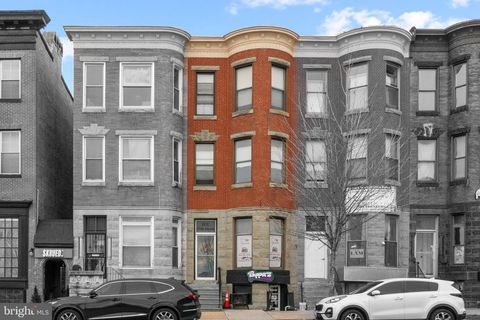Photo of 28 E 25th Street, BALTIMORE, MD 21218 (MLS # MDBA2203002)
