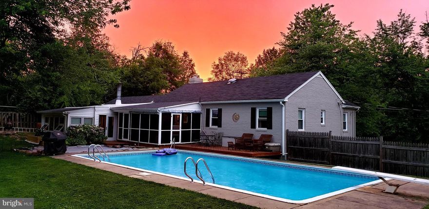 ***OPEN SUNDAY 1-3pm*** INTRODUCING 5609 Colfax Avenue—a rare opportunity to own a stunning home on an expansive half-acre lot in the heart of Dowden Terrace, a picturesque community blending modern and classic traditional homes. This 3-bedroom, 3.5-bathroom residence offers an unbeatable combination of space, convenience, and charm—all within minutes of Seminary Rd., I-395, the Mark Center, the Pentagon, and Washington, D.C. Freshly painted throughout and featuring brand-new luxury vinyl plank (LVP) flooring, this home is move-in ready with modern updates. The inviting living room is centered around a beautiful fireplace, creating a warm and welcoming ambiance, while the kitchen boasts brand-new granite countertops. All three bedrooms have new plush carpeting, adding comfort and warmth. Designed for effortless living, the main level includes a primary bedroom with an ensuite bathroom, two additional bedrooms, and a convenient full-hall bath. Just off the dining area, the screened-in porch provides the perfect spot for morning coffee or evening relaxation, with easy access to the fenced-in backyard and in-ground pool—a private retreat for outdoor enjoyment. The spacious lower levels offer exceptional versatility, featuring a sunlit family room with expansive windows and a cozy wood-burning fireplace. A second large family/rec room provides even more space for entertaining and includes a convenient kitchenette, perfect for hosting guests or creating a separate living area. Two generous bonus rooms offer flexibility for a home office, gym, or hobby area, while a full bathroom and ample storage options enhance the home’s functionality. Additional highlights include an attached carport and multiple storage solutions. LOCATION: Outdoor enthusiasts will love the nearby Fairfax County park, Dowden Terrace, which offers sports fields, basketball and tennis courts, and a playground—all just moments away. The home's prime location is near Metro bus stops, the DCA airport, schools, hospitals, and Old Town Alexandria. Enjoy quick access to restaurants, shops, and daily conveniences, making this home a commuter’s dream while offering the perfect blend of suburban tranquility and urban accessibility. Don’t miss this unique opportunity to own a spacious home on an exceptionally rare lot in one of Alexandria’s most desirable neighborhoods!