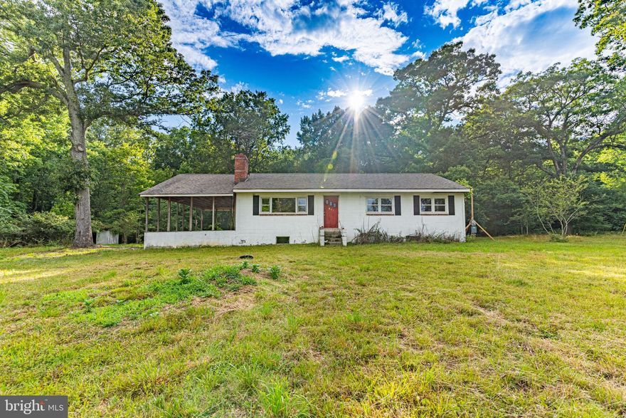 ATTENTION ALL INVESTORS. 2.61 beautiful acres with a rehab prepared house with a LaPlata address!!!.  Demo is done and an all new architectural shingle roof, including all plywood has been completed. Temporary power has been permitted, installed and inspected. Permit was applied for by original contractor for the rehab but was never completed. Permit application information available upon request. A house location survey has been completed and is available in the documents tab. Side porch foundation has been inspected and certified by a Structural Engineer, documentation available upon request.  Well was installed by Frank's Well Drilling in 2002, documents available in documents tab. Septic system was inspected but did not pass. Repair perc test was completed and determined that an innovative mound system will be required for the new system. Information from the environmental company is included in the documents tab. Some termite damage is visible on the framing from the basement.  House has incredible potential. Please call listing agent with any questions.