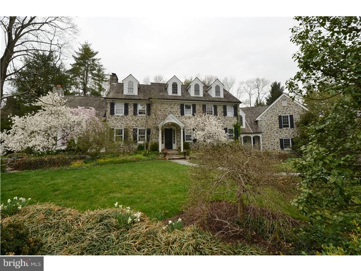 Bright, balanced and beautifully executed five bedroom stone colonial enjoys recent updates and expanded spaces on flat .83 acre parcel with pool, koi pond and exquisite land and hardscaping by Mulberry Design. Welcoming foyer opens to a handsome Living Room with fireplace and beyond to the recent addition of the one and a half story Family Room with barrel ceiling detailed with wood trusses and enhanced by views of the pond and front gardens. Formal Dining Room, cozy Den with original wood paneling and all white Kitchen with spacious Breakfast area offers a wall of windows open to the rear yard, pool, stone terrace and built-in seated entertaining area with gas grill. Two story Atrium with greenhouse window provides functional transition space between the family entrance, kitchen and second floor open study area. Highlights of the second level include spacious Master Suite with renovated white marble and glass tile bath and fully outfitted, room sized walk-in closet.