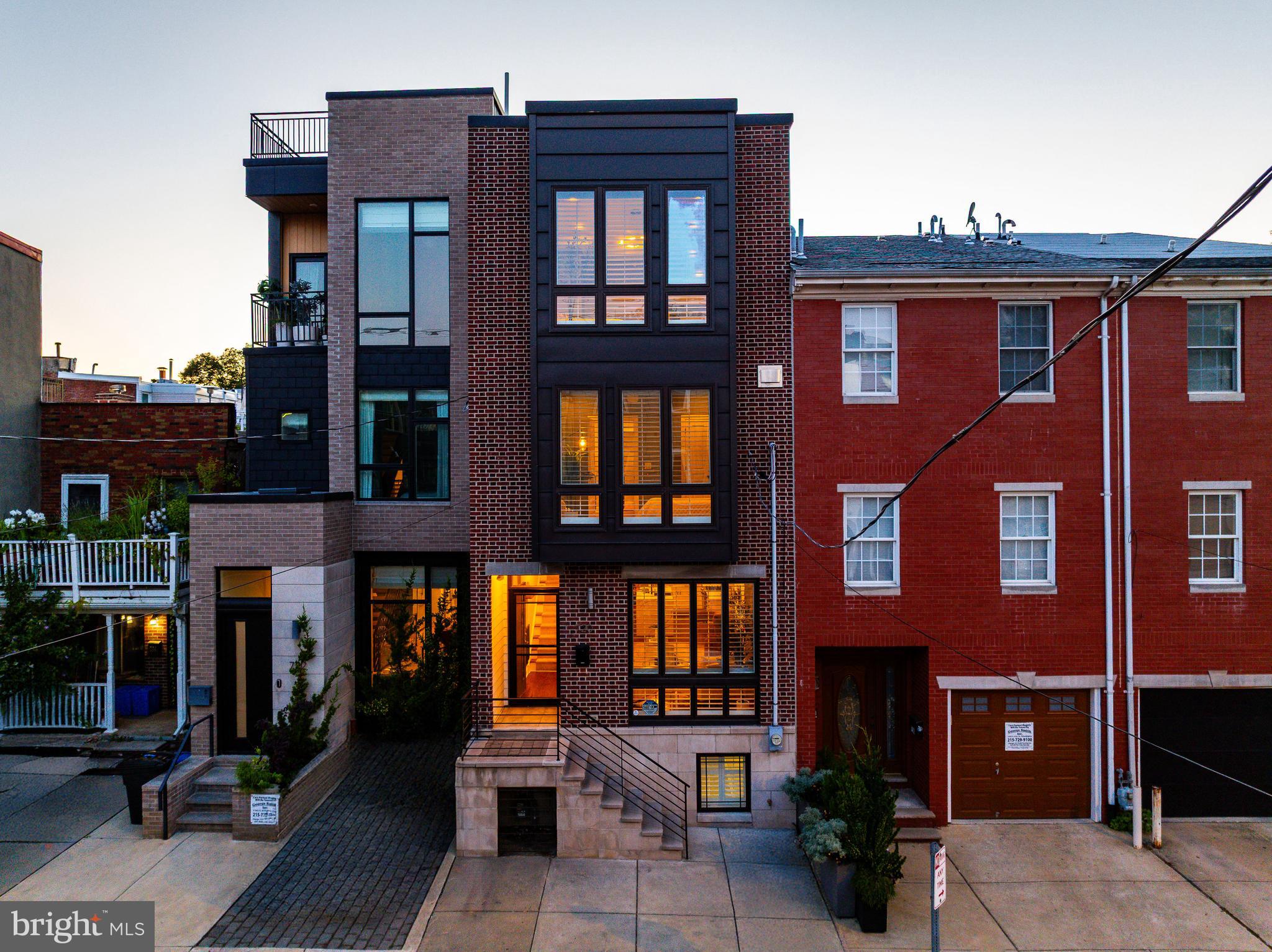 Welcome to 720 S 19th Street - a beautifully maintained, one-of-a-kind home in the heart of Graduate Hospital. Built in 2016, this 4-bedroom, 3.5-bath residence offers a ton of livable square footage, a full finished basement, and two incredible outdoor spaces including a show-stopping roof deck with sweeping city views.
The first floor offers a spacious layout featuring a large living room, a cozy sitting area, and a massive kitchen with stainless steel appliances, ample cabinetry, and a dedicated pantry for storage. A convenient half bath and easy access to one of two outdoor spaces - complete with turf, perfect for pets and kids - make everyday living and entertaining seamless.
On the second floor, you'll find two generously sized bedrooms, a large full bathroom accessible from both the hallway and one of the bedrooms, plus a full laundry area for added convenience.
The third floor is home to a custom wet bar and the luxurious primary suite, complete with a double vanity, oversized double shower, a private water closet, and abundant closet space. Just upstairs, the roof deck includes a custom irrigation system for the seller’s lush plantings - all included in the sale - making it a true urban oasis.
The finished basement offers flexibility with a big fourth bedroom, a full bathroom, additional storage all while providing a massive space for your every day basement needs - perfect for guests, a home office, or gym.
This home blends timeless style with modern functionality across three levels. The sellers have meticulously maintained the property, making it feel like a brand new home.
Located just a short walk from Rittenhouse Square, several parks, and Philadelphia’s top hospitals—including Penn, CHOP, Temple, and Cooper University- this is city living at its finest.