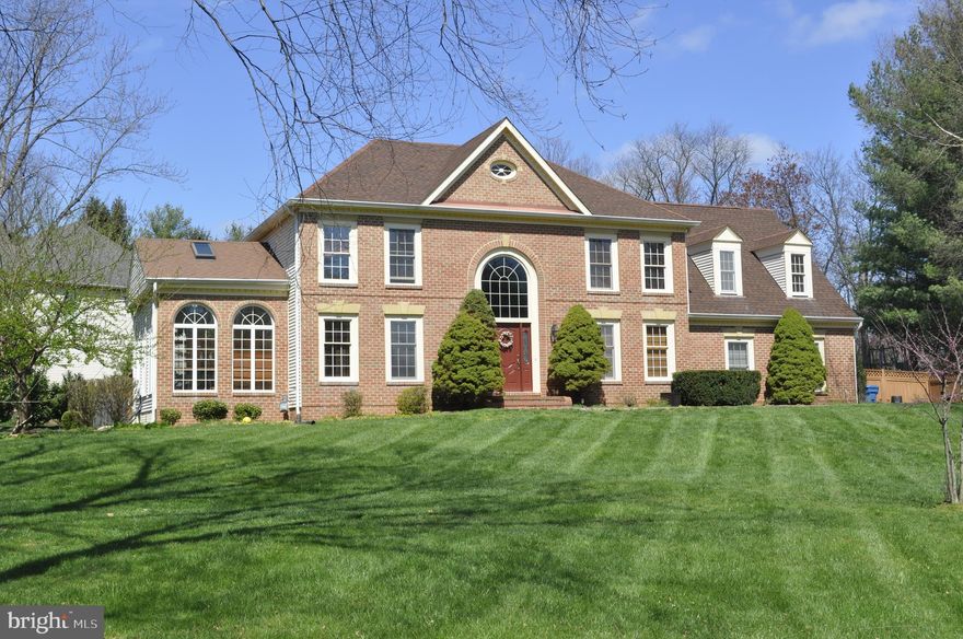 Gorgeous home in the popular community of Myterra Manor.  Owner has taken loving care of this home. Upstairs are 4 bedrooms, and 3 full baths.  Main level features  gleaming hardwood floors, formal living room, office, family room, gorgeous bright sunroom, formal dining room, breakfast room, and half bath. There are pleasing details throughout, like filigree wrought iron stair railing, upgraded baths, a raised counter at the kitchen sink with a picture window (perfect for herbs!), customized closets, and multiple ceiling fans.  Enjoy entertaining with the stunning lawn and spacious deck.  Downstairs you will find a large recreation area, a second family room, a bonus room, and a full bath. Oakton, Carson, Crossfield school triangle. Don't miss this one!