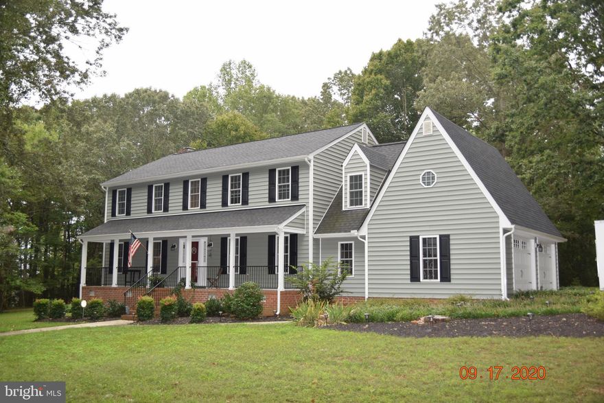 This is it!  5 AC of bliss...20 minutes to Fred'burg and 25 minutes to Richmond!  A pinnacle of cleanliness!  Built-ins in the office AND in the family room that flank both sides of the fireplace!  Sit on the front porch and rock your evenings away at this incredibly relaxing country retreat.  Slate and hardwood floors abound throughout the main level.  Enjoy lazy evenings by the fireplace or retreat to the sunlight filled Florida room.  An enormous Master Bedroom with beautiful tilework and a frameless shower waits for you after you're done for the night!  Tons and tons of cabinets in this big beautiful light filled kitchen that happens to have an awesome Bay Window for bird watching!  Stainless steel appliances and granite top off this amazing gourmet cooking space.