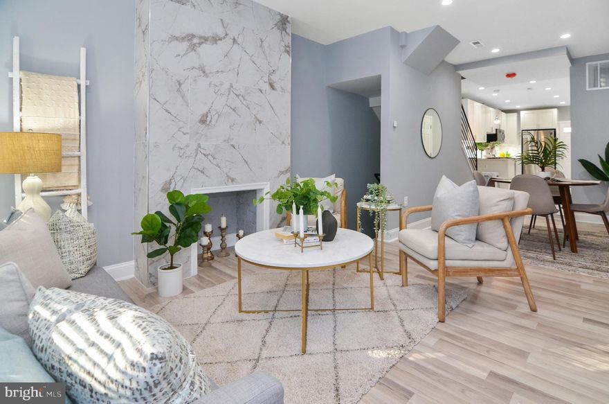 Live in Luxury!!  Welcome to this stunning, completely renovated, 2.5 bath, 5 bedroom townhouse on a quiet street, with remarkable details throughout. Prime location, just ten minutes from Johns Hopkins. This home offers a modern open floor concept that will take your breath away as soon as you take the first step into this Gem. Recessed lighting throughout, a very beautiful gourmet kitchen equipped with granite countertops, stainless steel appliances, tile backsplash, gas cooking and a breakfast bar. Enjoy a peaceful time in your private rear patio.  Don't hesitate and come check it out, it won't last long, it's priced to go.