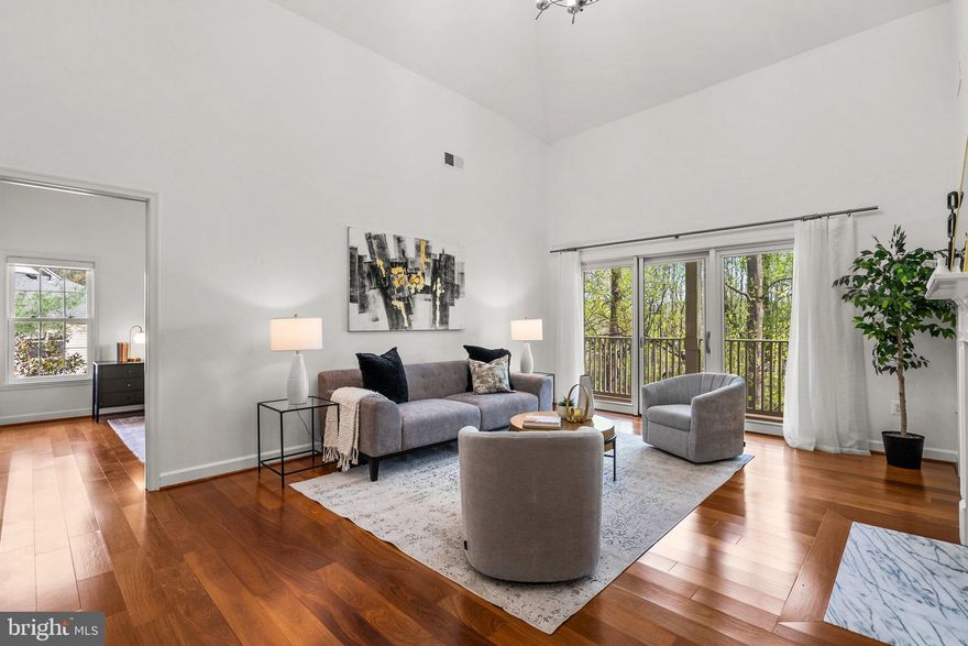 OFFER DEADLINE: Please submit best and final offers by Tuesday 4/29 at noon. Go see the rest and save the best for last - you won't be disappointed. Step into this beautifully maintained condo featuring soaring vaulted ceilings, gleaming hardwood floors, and three true bedrooms and three full baths. The main level features a well-designed layout and a stunning, newly renovated kitchen complete with brand-new cabinets and sleek stainless steel appliances, a separate dining area, and an airy living room with a gas fireplace. Enjoy the tranquility of the outdoors from the spacious rear balcony, accessible through sliding glass doors—perfect for unwinding with views of the trees and creek. The main level includes two generously sized bedrooms, each with its own ensuite bath and walk-in closet. Upstairs, the spacious loft level overlooks the living room and includes a third bedroom, full bath, and a large laundry/storage room with built-in shelving for convenience. Located just minutes from I-270 and Route 355, with easy access to public transportation. You'll love being close to Crown, Rio, Sugarloaf Mountain, parks, the Decloverly Community Pool, and a wide variety of shops and restaurants. Additional perks include plenty of parking and a dedicated storage unit in the building corridor. This one won’t last long—schedule your tour today!