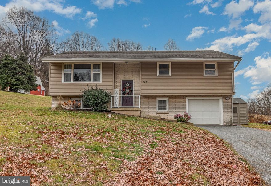 Welcome home to this charming bi-level nestled in Lewisberry! This well maintained home is situated on 1 full acre of land, allowing for space and privacy from neighbors. Featuring 3 bedrooms and 2 full bathrooms on the upper level and 1 bedroom with 1 full bath on the lower level, this home has so much to offer for its new owner. A  finished walk-out basement allows for ample living space and the potential for customization to suit your needs. Not only is there an attached 1 car garage, but also a double wide asphalt driveway for all guests! With its thoughtful design and convenient location in Fairview Twp, this property exemplifies comfortable, spacious and tranquil living. Contact today to come see this adorable home for yourself before it's gone!!