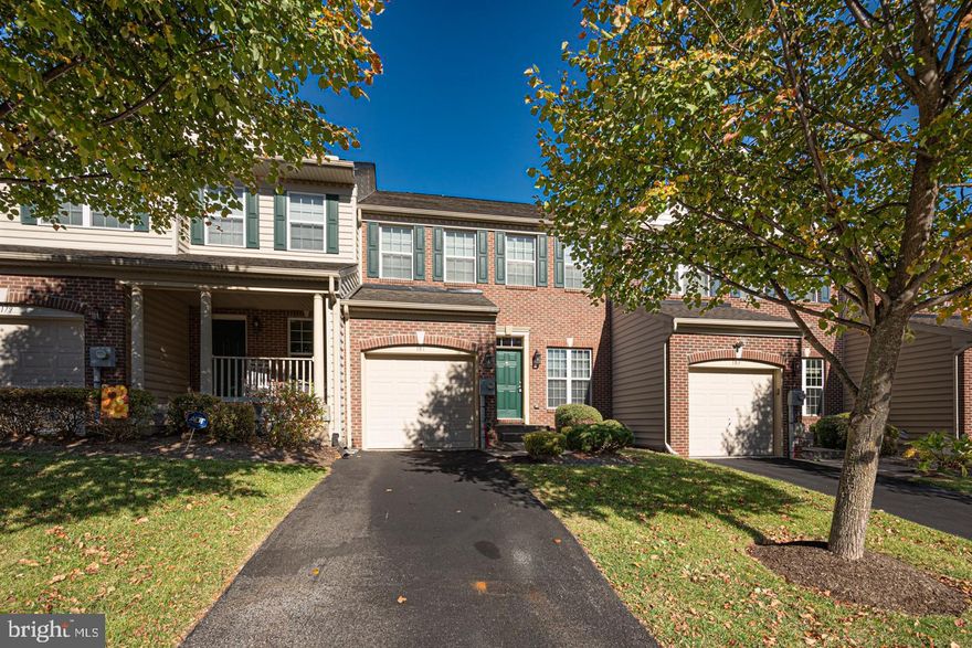 OPEN HOUSE Saturday, November 8th, 12:00-2:00!! Absolutely Immaculate and Thoughtfully Updated Interior Brick Front Townhome in Sought-After Penns Manor...Within Walking Distance to All that Kennett Borough has to Offer!!  Spotlessly Clean, Bright, &  Situated on a Premium Homesite with Open Space Views, this is the Best of the Best with Fabulous Curb Appeal and High-End Interior Finishes.  Plank Flooring Throughout Main Level, Crown Molding, Fresh Paint, and an Open Floorplan with Great Natural Light.  Kitchen with Oak Cabinetry, Stainless Appliances, Recessed Lighting, Large Pantry, and Access to Oversized Composite Deck.  Family Room Open to Kitchen with Open Staircase to Second Floor.  Primary Suite with Cathedral Ceiling and NEW Gorgeous Bath, Fully Tiled with Walk-In Shower and Quartz Countertops, Plus California Closet Design in Walk-In Closet.  Two Additional Bathrooms Share Updated Hall Bath and Both have California Closets.  Laminate Flooring Throughout Second Floor...No Carpets to Replace!!  Daylight Finished Lower Level with Walk-Up Staircase to Exterior and Plank Flooring.  Unfinished Area has Rough-In Plumbing for Full Bath.  Walkable Community with Sidewalks and Playground...and LOW HOA Fees are only $135/Month!  Rare Opportunity for a 100% Move-In Ready Home at a Great Price Point--Immediate Occupancy is Available--Just Bring Your Holiday Decor!!