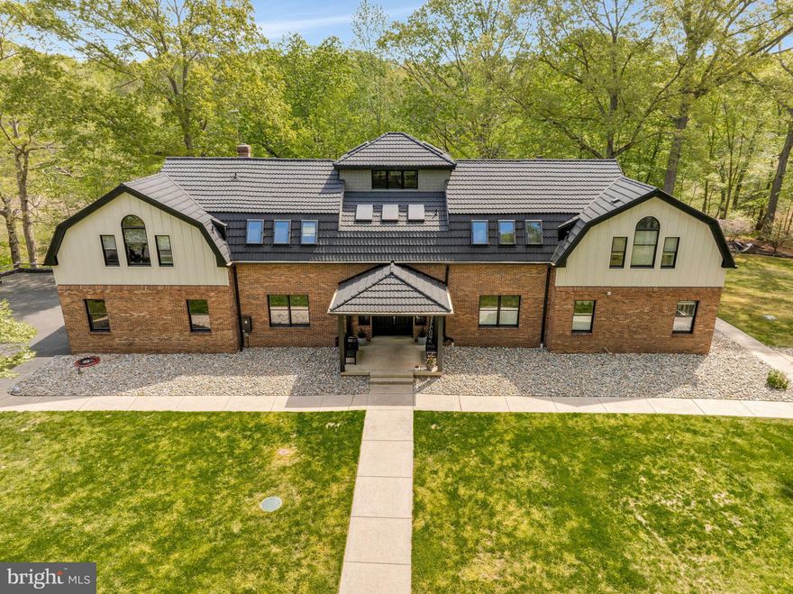 Spectacular Custom Built Waterfront Home resting on a picturesque 5 acre lot surrounded by mature trees. This magnificent Estate has been thoughtfully renovated inside and out. This home boasts gleaming hardwood floors, beautiful exposed wood beams, vaulted and cathedral ceilings, palladian windows, private elevator, skylights, elegant molding, heated bathroom floors, chefs kitchen with double wall ovens, 6 burner gas cooktop with a convenient built in pot filler wall faucet, deep single basin sink, butlers station, walk-in pantry, granite counters with bar seating and matching granite table, the grand master suite walks out to screened porch overlooking Friday’s Creek, spa-like master bath with his and hers vanities, the main level could be independent living for aging parent(s) with 2 bedrooms, ensuite bath and 2nd full bath with sauna shower, full kitchen and laundry and has access without negotiating any steps, finshed walk out basement with game/rec room and plenty of storage space, amazing outdoor living and entertaining with expansive upper & lower decks, front and rear patios, fire pit, camp style outdoor grill, pier & walking in riding trails through the property and down to the waterfront. Attached 3 car garage, detached 3 vehicle garage that is also an apartment with electric, seperate HVAC, full bath and kitchen. This home offers the the luxury and tranquility of a vacation retreat with the convenience of being located within a 30 minute drive to DC, NOVA and Annapolis. Great schools and there is NO HOA!