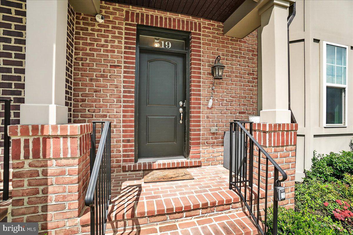 This "Ascroft" model, featuring 4 Bedrooms and 2 & 1/2 Baths, was built by Wormald, an award winning  builder since 1964.  All 4 levels have an extra 3 foot bump out giving additional square footage to enjoy.  The best energy saving appliances and insulation package were used  to help keep those utility bills down!   You'll find upgrades such as granite island kitchen, a pot spigot above the stove for those who love to cook and marble counters in the bath rooms.   This prime end unit lot not only provides more sapce, but it faces the neighborhood open space.  For entertaining, there is a wet bar and additional balcony on the top level and stone patio off of the living room.  The theater room in lower level contains a surround sound system that conveys.   The top level can also easily serve as the 4th bedroom.     Close to Historic Downtown Frederick but easy access to 70 and 15.     This is a must see!