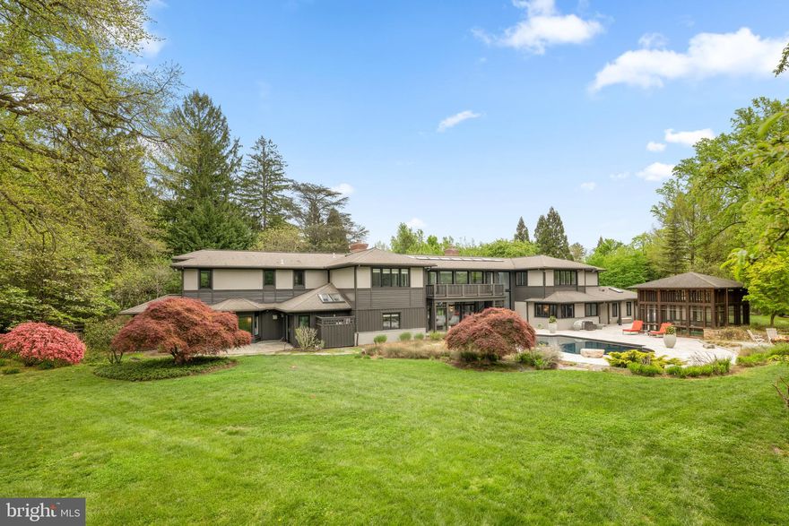 Nestled in the heart of Villanova, 850 Lesley Rd is a modern masterpiece that seamlessly blends contemporary design with the serenity of nature. Thoughtfully updated to bring the outdoors in, this home redefines comfortable, stylish living, while connecting you to its landscape from the moment you step inside. This home is perfectly situated on two of the most breathtaking acres in Radnor Township. The living and dining areas have been unified by an open floor plan that boasts soaring ceilings and expansive glass walls, effortlessly linking indoor and outdoor living spaces. Natural light pours into the heart of the home, illuminating the exquisite resort-like pool, an impressive screened-in gazebo, with room for a dining table and sectional couch, designed by Archer Buchanan and an enchanting backyard oasis. This intelligently designed layout leads you into two distinct wings that separate family-friendly spaces from luxurious first-floor bedroom suites. Experience the seamless flow from the gourmet kitchen with a dedicated breakfast area to the library / sitting room and the family giant screen TV room with a beautiful front garden view and modern French door access to it. . Notable features include hard wood and tile flooring, stainless steel countertops, top-of-the-line commercial appliances, and magnificent cabinetry with built-ins. This area is complemented by convenient mud and utility rooms featuring elegant river rock flooring and an attached three-car garage all with extensive storage space. The adjacent wing boasts two spacious bedrooms, a hall bath, and an exceptional Primary Bedroom suite that features a spa-like bathroom retreat including a steam shower. The stunning open solid Oak staircase, also designed by Archer and Buchanan, leads you to the second floor, where a bridge spans the entire length of the house, creating a gallery that overlooks the breathtaking backyard. Each wing is thoughtfully designed, offering two bedrooms with adjoining baths, as well as two fabulous bonus rooms that can easily serve as an office, game room, gym, or studio. Outside, the flow continues with beautifully landscaped grounds that feel like an extension of the home itself. Stone pathways wind through the gardens and mature trees, leading to inviting spaces throughout the property. The partially finished basement provides additional storage. Most systems in the house have been completely updated, and now features a whole home (including outdoor pool area) mesh Wi-fi network that supports a fully automated and app controllable heating and cooling, lighting, whole house audio and video system as well as pool filtration equipment, including a salt chlorine generator.  Heating and cooling is provided by five air handlers and two radiant heat hot water heater furnaces with a total of 21 heating and 13 cooling zones independently controllable and schedulable.
. Most recent improvements include a completely repainted exterior, extensive tree planting, and re-paved/sealed driveway 850 Lesley Rd is more than just a home—it’s a statement. Combining contemporary luxury with natural beauty, this property offers a truly elevated lifestyle in one of Villanova’s most sought-after locations.