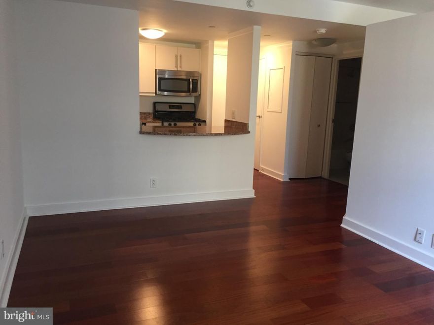 Beautifully appointed junior one bedroom at Parc Rittenhouse. This lovely home features wood floors; a spacious great room with space for living, dining, and entertaining, an open kitchen with contemporary cabinetry, stainless steel appliances, a tile floor, granite countertops and a washer/dryer; a perfectly sized bedroom with wall closet; and a marble-appointed bathroom. Residents of Parc Rittenhouse enjoy world class amenities and services including a 24 hour doorman; an amenities suite that includes a brand new state-of-the-art fitness center and resident lounge with pantry; media room; outdoor rooftop pool club with a large pool deck, full size pool, kids pool and hot tub; garage parking below the building for an additional fee; and two amazing restaurants on the ground floor, Stephen Starr’s Parc and Via Locusta.