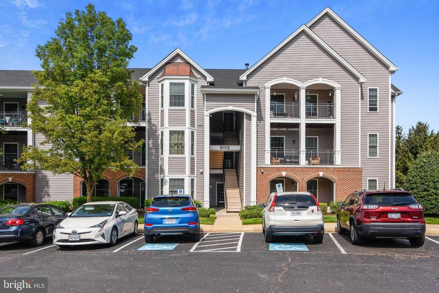 Welcome Home!  You’ll love this one-level condo in Riverbend at Cascades! This 2-bedroom, 2-bathroom home has 1,008 sqft. of spacious elegance, with new hardwood floors throughout!  This home features an open floor plan with the bedrooms on opposite sides allowing for privacy. The spacious primary bedroom features a large walk in closet for ample storage. The primary bathroom features a tub/shower combo with tile flooring and lots of counter space. The large second bedroom features an over-sized sunlit bay window with a ceiling fan, mirrored closet and its own private bath.  Never miss a conversation! Entertain in your large kitchen with the pass through to the living room.  The laundry room is adjacent to the kitchen and allows for extra storage. The living room is light and bright, features a fireplace, and has easy access to your own large balcony. There is an additional secure storage room on the balcony that holds a new Heating unit system & water tank. This is the only building in Riverbend at Cascades with an elevator.  Recent updates to the building include windows, siding, and the roof. The condo fee includes water, and sewer. There are plenty of visitor parking spots along with your 2 parking spaces.  Enjoy fabulous community features & amenities that include swimming pools, community and fitness centers, tennis courts, basketball courts, tot-lots and miles of biking trails! Great location near routes 28 & 7. The home is minutes from shops, restaurants, theaters and weekend concerts and also minutes to Potomack Lakes Sportsplex, Algonkian Regional Park and extensive paved walking trails within the community.