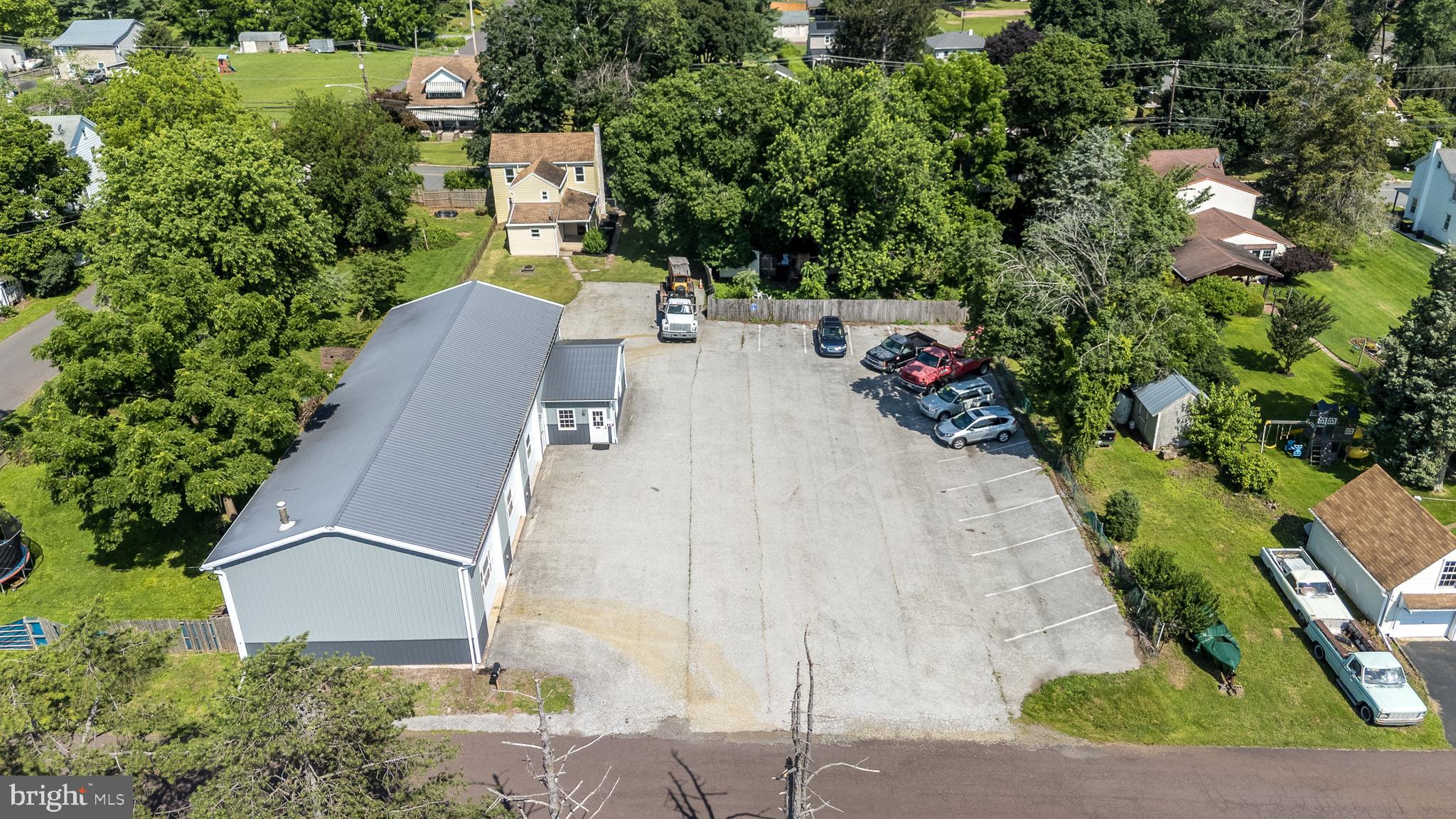An excellent opportunity for you is being offered. Nesspor’s Auto Repair is on the market for
the first time! Auto Shop located at 387 Whartnaby St: At just 14years old this 4-bay
Garage is PRISTINE! It is currently an Official State Inspection and Emissions Shop. The
building has approximately 2,400 sq ft of space with 16’ ceiling height, 12’x12’ Doors. Starting
at the far end of the building there is a 4-post drive-on lift capable of lifting 14,000 pounds,
followed by a 10,000 pound Twin-post then another 10,000 pound 2-post Asymmetrical lift –
not even one year old - finishing up with the final lift being a large12,000 pound Twin-post lift.
All lifts are Rotary brand. With this set up, any vehicle type can be handled by this shop. There
is a private office for the public and parking to handle 15+ vehicles on any given day. Garage is
Hot Air heat using waste-oil, has Central Air Conditioning, 50gal Water Heater and 200amp
electric service. Additionally, as a plus there is a 3-bedroom, 1-bath residential building that can
be rented for additional income or Live where you work. The Home located at 386 Laurelwood
Rd: The interior has been recently updated. Kitchen has Cherry Cabinetry with Pantry, Tile
Counters, SS Refrigerator, Dishwasher, Double SS sink. Bathroom has tub/shower combo with
large Mahoghany cabinet and full mirror. Flooring is 12x12 ceramic tiles. Completing the first
level are the separated Dining, Living and Family Rooms. Plank Flooring is throughout the first
level including kitchen. The 3 bedrooms on the 2nd level are carpeted. The Lower Level
Basement has access to the yard via the Bilco Door. Roof was replaced in 2010. Heating
System (Oil Hot Air) was installed January 2025, 40Gal Water Heater.