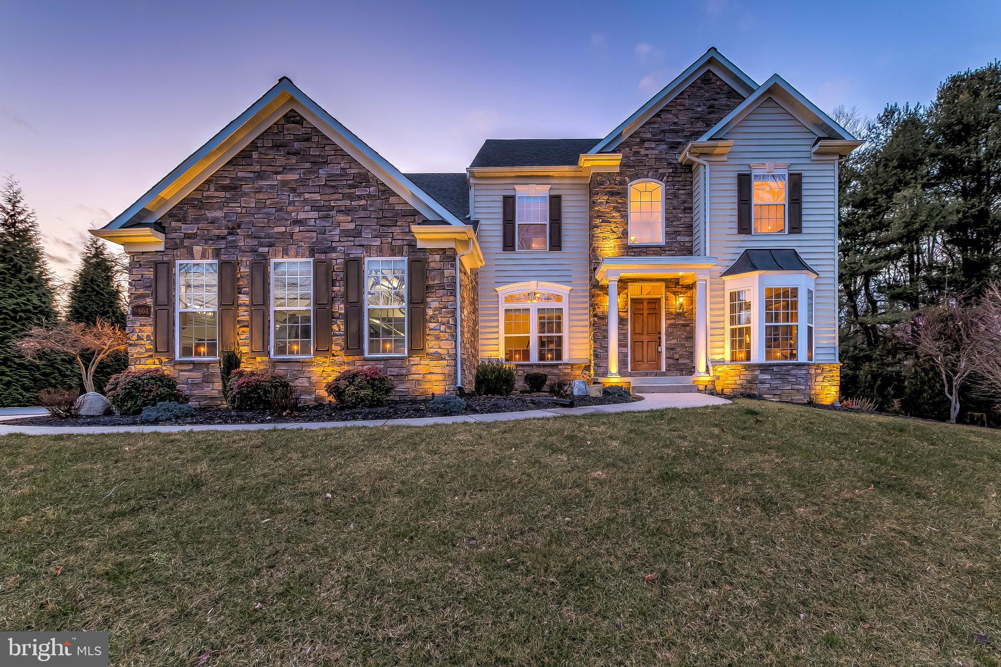 Set on over one-half acre, this exquisite NV Built Colonial is tucked away on a quiet cul-de-sac with every convenience within reach. Construction details will suit the most discerning buyer. 9804 Anvil Court features a 3 Car Insulated Garage w/Hot and Cold Water Hookups, Paver Patio w/ Built-In Bistro Table, Dual Zoned Natural Gas Heat, Yard Irrigation System, Invisible Fence, Low-e Windows - all before even entering the home. The Interior spaces are defined by open design illuminated with multiple window features and soaring ceilings. The Generously Proportioned Family Room expands to the Kitchen, Island and Breakfast Room accommodating for every social aspect of the day. Snuggle up near the heartwarming fireplace or take an important call in the Private Home Office. Pamper yourself in the Sprawling Master Bedroom which offers Dual Walk-in Closets and Tray Ceilings with Up-Lighting. Wash away the day in the Generous Walk-In Shower or Jetted Oversized Tub. Convenient Upper Level Laundry and Finished Lower Level w/Custom Bar. Possible 5th Bedroom and Full Bathroom as well as Open Rec Room space.