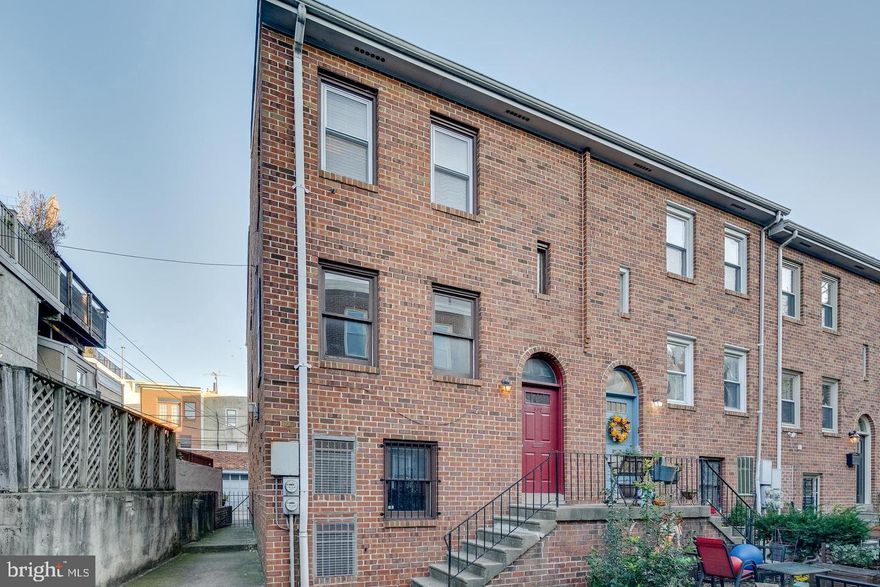 Available June 1st. Tucked away in Philly's vibrant Queen Village neighborhood, 830 S Howard St #1 is a completely renovated 2 bed, 1.5 bath bi-level corner unit with 2-car parking and a den. An idyllic courtyard, with gardens and picnic seating, welcomes you at the front of the building. Inside the unit, high ceilings and new luxury flooring frame the bright and airy living room. This open space is filled with natural light from 3 windows, while a 4th window brightens the dining area. The kitchen is fitted with new stainless steel appliances, including a dishwasher, and plenty of cabinet & counter space. There's also room for extra storage or a small table. Down the hall, you'll find a closet and an updated full bathroom. Completing this level are two spacious bedrooms, with a pair of sliding doors off the larger room leading to a Trex deck spanning the unit's width. On the lower level, there's a spacious den anchored by a brick fireplace, perfect for a home theater or game room. There's also a powder room, storage closets, and access to the shared laundry and garage. 830 S Howard's fantastic Queen Village location earns a Walk Score of 93! Nearby South St features markets, restaurants, and cafes, including Whole Foods, ACME, Good Karma, and Bridget Foy's. South of Washington Ave, neighborhood favorites Herman's Coffee, Charlie's Roast Pork, and Pennsport Beer Boutique line E Moyamensing Ave. Shot Tower playground & rec center and Jefferson Sq Park are a few blocks away, plus Target, Acme, Wine & Spirits, Ikea, and Lowes are close by. There's also easy access to public transit, Old City, I-95, and South Jersey via I-76. Schedule your in-person or virtual tour today!