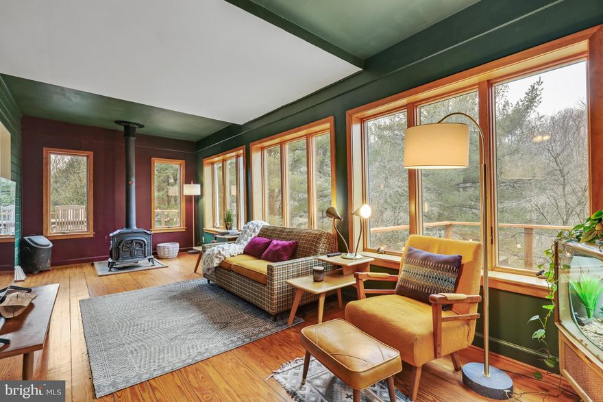 REDUCED PRICE TO HELP YOUR MORTGAGE PAYMENT!! Buyer's Financing fell through on our last deal and we're back on the market! WOULD YOU LOOK AT THAT VIEW! If you're looking for peace, quiet and the great outdoors, well this is the place is for you! The property has character and you can see it in the craftsmanship. Decks on both sides of the house that overlooks the NCR trail/ creek! Looking for more adventure? Checkout Gun Powder Falls State Park, Dixon's Antiques, Greystone Golf Course, or the handful of wineries nearby as well....  Recent updates are: Well in 2012, New Roof 2018, UV Water Filter 2021, New A/C system and venting 2021, New Septic system in 2022, New kitchen appliances, updated paint throughout the home, new deck railing tops and stain, shutters, porch lights and more.  Don't miss your chance to own a great looking home in a sought-after area!