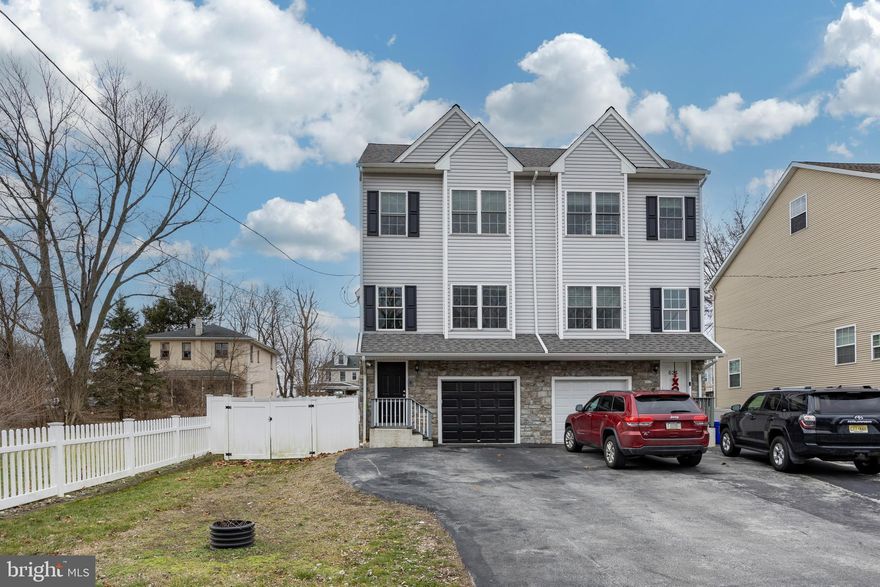 Welcome to 622 Fulton St.  This newer Conshohocken Twin has lots to offer, located on a 'no through street' means less traffic and quieter, more private living... 
PLUS!!! No parking worries here!  1 car attached garage with parking for 2 + cars in the driveway.

The front entrance leads you to a large, open living / dining / kitchen area with lots of space to entertain.  Easy to maintain, luxury vinyl flooring throughout the home.  
The kitchen is equipped with beautiful granite countertops, Stainless steel appliances and an island for additional counter space.  The main floor includes a powder room and entrance to a large deck. The rear deck and lower level patio provide wonderful areas for relaxation and entertainment.

The second floor includes 2 owners suites. Each suite having its own luxury full bath,  providing privacy and convenience.
The large third floor bedroom also includes a full bath and custom walk in closet.  This home has lots of storage!  

Finished lower level family room/ game room / work out area and includes a laundry area with stackable washer/dryer, Powder Room and entrance to the garage.  
Walk out to your patio and fenced yard, so beneficial for tenants with pets or children, providing a safe space to play.  
The patio includes a hot tub and gas grill on deck.  (Tenant is welcome to use but responsible for maintaining)