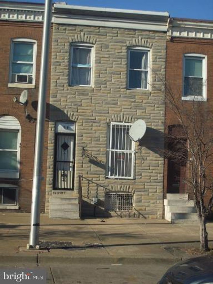 House has beautifully designed ceilings in living room and dining room. Very large kitchen with lots of cabinet space. Great property to add to your rental portfolio. Close to schools, bus line, and downtown inner harbor. Sold 'As Is'.