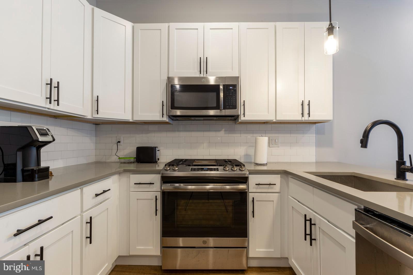 Available Early June:
Welcome to 910 N 17th St #1F! This stunning first-floor unit offers 2 bedrooms and 1.5 bathrooms with a stylish modern design. You’ll enjoy off-street parking, hardwood floors, recessed lighting, central air, and in-unit laundry. Step into the bright and open living space with two front-facing windows that bring in plenty of natural light. The kitchen sits just beyond the counter with accent lighting and features white shaker cabinets, a subway tile backsplash, and sleek stainless steel appliances. A powder room nearby makes entertaining easy. Head downstairs to find two bedrooms, a full bathroom, and a stacked washer and dryer at the bottom of the staircase. Each bedroom is spacious with a window and great closet space. The bathroom is beautifully designed with slate tile flooring, a lighted vanity, and a full-size bathtub-shower combo. Schedule your showing today!
Lease Terms:
Generally, 1st month, 12th month, and 1 month security deposit due at, or prior to, lease signing. Other terms may be required by Landlord. $55 application fee per applicant. Pets are conditional on owner's approval and may require an additional fee, if accepted. (Generally, $500/dog and $250/cat). Tenants responsible for: electricity, gas, cable/internet, and a $40/month flat water fee. 1 off-street parking spot is available for an additional $200/month. Landlord Requirements: Applicants to make 3x the monthly rent in verifiable net income, credit history to be considered (i.e. no active collections), no evictions within the past 4 years, and must have a verifiable rental history with on-time rental payments. Exceptions to this criteria may exist under the law and will be considered. Cosigners accepted.