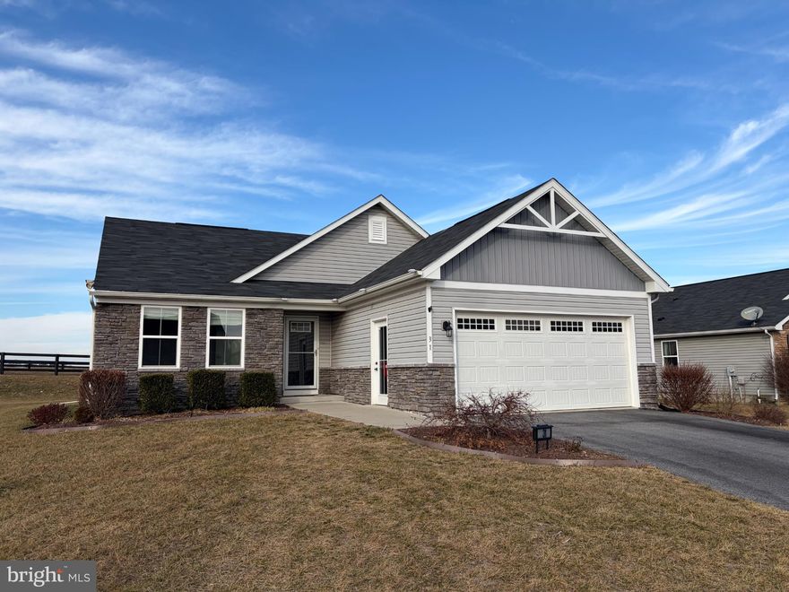 Former model home that still shows like a model! For starters, there is brand new LVP flooring throughout the main level and brand new carpet in all the main level bedrooms. Secondly, the entire home was painted in January 2026. This home is perfect for multi generational living with ample finished living space in the basement that includes a huge recreation room (with a water line already installed in the closet under the stairs for a future wet bar), even bigger bedroom with walk in closet, large flex/media room with walk in closet, full bathroom with a beautifully tiled shower, and storage room. All flooring in basement is LVP. The main level has an open floor plan perfect for entertaining with a granite kitchen island for gathering and conversing with those in the dining and living room. Another thing to love is the epoxy floored garage. This home is move in ready and situated perfectly for those utilizing the VA Medical Facility as well as commuters heading to MD or VA. Super close to restaurants, schools, and shopping. Professional photos will be uploaded soon!