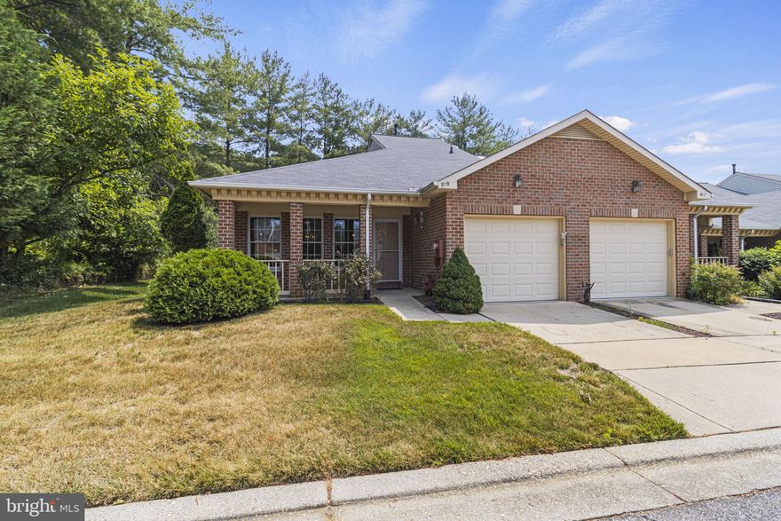 Enjoy the exceptional lifestyle you’ll find in this all brick, spacious end-unit home located in Heritage Harbour, an appealing active adult community featuring world-class amenities and a desirable location close to Historic Annapolis, The US Naval Academy, Routes 50 and 97. This spacious floorplan features a generous living room, separate den/flex space offering a cozy fireplace with an electric insert, dedicated laundry room with utility sink, single-bay attached garage for storage/parking. Large eat-in kitchen features plenty of cabinet and counter space. Primary bedroom features walk-in closet, en suite bath with double-sink vanity. Outdoor spaces include charming front porch and roomy private deck, ideal for grilling, dining and entertaining. You’ll love living in Heritage Harbour, a 55+ community featuring a lake plus private South River access with a pier and ten 30 ft boat slips, kayaking  & canoeing. Community activities center called The Lodge features an indoor and outdoor pool, fitness center, woodworking shop, and multiple event spaces plus bocce and horseshoe courts; and the Golf and Tennis Complex offers nine tennis courts (3 are lined for Pickle Ball), a nine-hole golf course, clubhouse pro shop and dining room. Bring your boats and RVs; Heritage Harbour features a secure storage lot for added peace of mind.  Come see! 
All Buyers pay a one-time fee of $2075  to HHCA upon settlement.