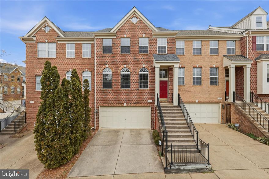 FOR RENT Welcome to this beautifully updated 4-bedroom, 3.5-bath, 24-ft wide townhouse with a two-car garage located in the highly desirable McNair Farms community of Herndon, VA. Offering approximately 3,000 sq. ft. of well-designed living space, this move-in-ready home features fresh paint throughout, including trim, windows, and ceilings, creating a bright and inviting atmosphere. The main level showcases high-quality wide-plank hardwood flooring, while the upper and basement levels feature carpet with extra padding for added comfort. Recessed lighting throughout enhances the home’s open and airy feel. The kitchen is a standout, offering custom white countertops, upgraded sink and faucet, white appliances, a French-door refrigerator, and a newer built-in overhead microwave, along with a bump-out extension that provides flexible space ideal for a breakfast nook, home office, or reading area. The third level features a spacious primary suite with an upgraded bathroom, oversized shower, and large walk-in closet, along with two additional bedrooms, a full bathroom with double sinks, and a conveniently located laundry room. The fully finished basement offers versatile space suitable for a recreation room, home gym, media room, or guest suite. Additional highlights include an oversized two-car garage with ample storage, a long driveway for extra parking, and a private deck perfect for outdoor relaxation or entertaining. Situated on a quiet dead-end street with plenty of guest parking, this home offers a peaceful and family-friendly setting. Residents enjoy outstanding McNair Farms amenities including multiple pools, community centers with gyms, club rooms and movie theater, tot lots, walking and biking trails, lawn maintenance, snow removal, trash and recycling services, and extensive common area maintenance, with restaurants, shopping, fitness centers, and Frying Pan Park located just across the street. The home is ideally located near Giant grocery store (.2 miles), medical offices, gas stations, Clock Tower Shopping Center, Reston Town Center, and offers access to 18 miles of paved trails, tennis courts with lights, sand volleyball, farmers markets, and year-round community events. With excellent commuter access to the Dulles Greenway and Toll Road, Routes 50, 7, 15, and 28, within 3 miles of the Herndon Silver Line Metro, 7 miles to Dulles International Airport, 3.5 miles to Reston Town Center, and 20 miles to Tysons Corner, this home blends modern updates, comfort, and convenience—making it the perfect place to call home.