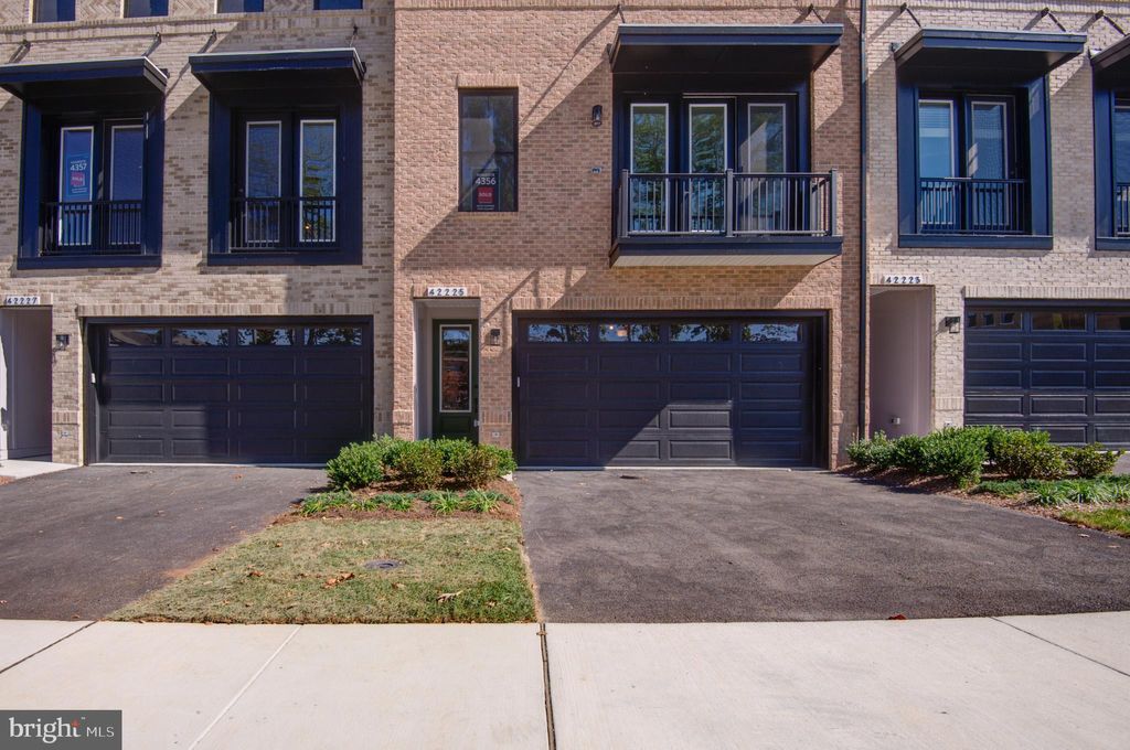 Photo of 42225 Shining Star Square, BRAMBLETON, VA 20148 (MLS # VALO2108362)