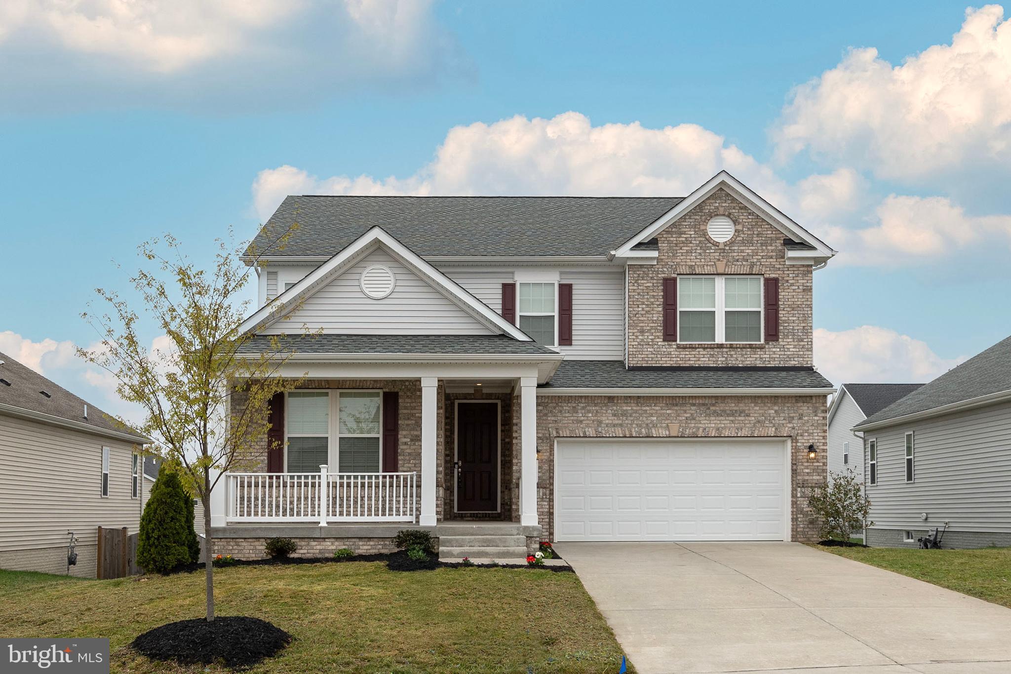 This 5 year young Colonial is a stunner! Located in the desirable Southern Hills Community, it is centrally located just minutes to I-81 and route 11. A charming covered front porch welcomes you inside, where beautiful LVP flooring flows seamlessly throughout the main level. A spacious open floor plan is perfect for entertaining family and friends. You'll feel like a Chef in the fully equipped kitchen, showcasing dark cabinetry, SS appliances, granite countertops and an elegant backsplash. The oversized island adds an abundance of counter space and storage, as well as seating for 4. The adjoining dining area leads out to the deck, and the family room is accented by a sleek gas fireplace. A bedroom and full bathroom are conveniently located on the main level. Upstairs you are greeted by brand new carpeting throughout! The expansive loft is perfect for a den, play area or office. Two roomy bedrooms share a full bathroom, featuring an oversized vanity and a tub/shower combo. Enjoy the convenience of a second floor laundry! The primary suite offers the perfect spot to unwind in and is complete with an impressive walk-in closet and spa-like bathroom. Need more space? The unfinished walk out basement is a blank canvas, boasting 1310 sq.ft and is already plumbed for a bathroom and framed for additional rooms, leaving all the customization to you!