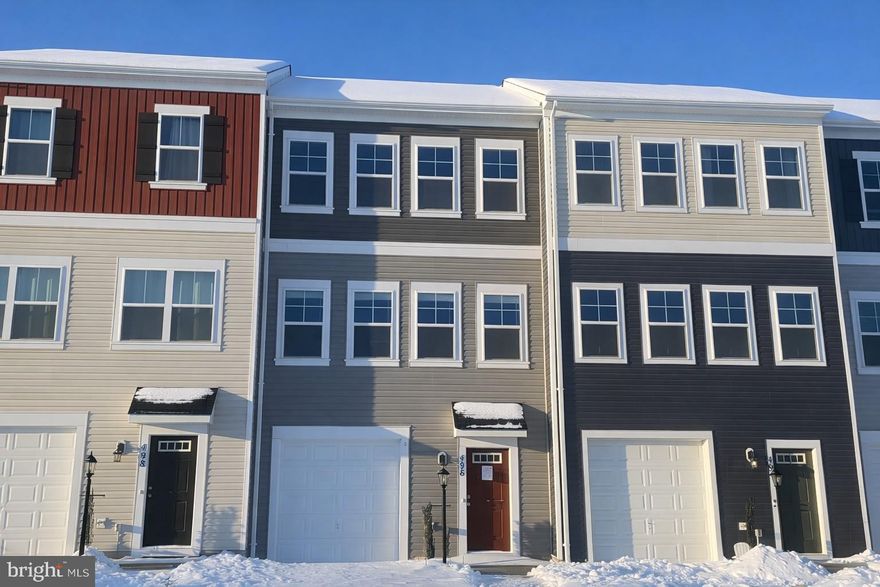 Discover the perfect blend of modern living and traditional charm in this townhouse located in the desirable Snowden Bridge community. Built in 2022, this interior row home offers 4 spacious bedrooms and 3.5 bathrooms, providing ample space for both relaxation and entertainment. Step inside to find a finished basement with convenient garage access, perfect for a home gym, playroom, or cozy movie nights. The walkout level invites natural light, creating a warm and inviting atmosphere throughout. The traditional architectural style, complemented by durable vinyl siding, ensures both aesthetic appeal and low maintenance. The heart of the home features an open-concept layout, seamlessly connecting the living, dining, and kitchen areas. The attached front-entry garage adds convenience, making daily commutes a breeze. With a modest lot size of 0.05 acres, enjoy a manageable outdoor space that allows for easy upkeep while still providing room for outdoor activities. Located in a vibrant community, you’ll have access to nearby amenities and a welcoming neighborhood atmosphere. This townhouse is not just a home; it’s a lifestyle. Embrace the opportunity to create lasting memories in a space designed for comfort and functionality. Don’t miss your chance to make this beautiful property your own!