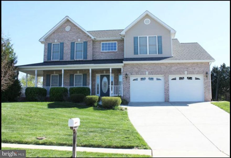 Gorgeous Colonial w/ 4BR, 2.5BA, walk up unfinished basement. Formal Living & Dining rms w/ hardwood. Tile in foyer, kitchen, & all BA's. Kitchen has granite tops, desk area, & island. Family rm w/ gas fireplace. MBR has trey ceiling, his & her closets, MBA w/jetted tub & separate shower. Wrap around front porch. Covered back deck,yard backs to common area. Owner provides lawn mowing and treatment