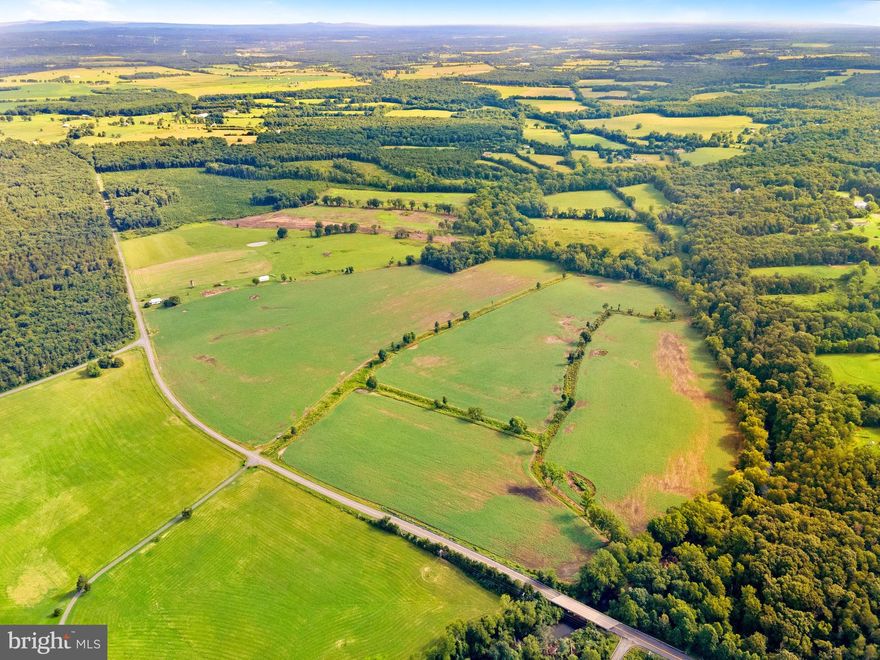 Presenting an Exceptional Business Opportunity: 256-Acre Farm Estate in Remington, VA

Welcome to a remarkable investment prospect that seamlessly combines agricultural potential, development possibilities, and natural beauty. Situated on an expansive 256-acre canvas in Remington, VA, this farm estate offers a myriad of avenues to explore and capitalize on.

Encompassing approximately 160 acres of meticulously maintained cleared farmland, this property presents an outstanding platform for agricultural endeavors. With a rich history of successful farming practices, you'll find fertile ground for cultivating crops, raising livestock, or establishing an agritourism venture.

Nature's beauty is woven into every corner of this property, with a portion adorned by majestic trees that provide shade, shelter, and potential timber resources. A gentle stream, Marsh Run, meanders along the property line, creating an enticing blend of water and land.

Adding to the property's appeal is a charming 3-bedroom, 1-bath tenant home spanning 1225 sq ft. This cozy residence offers on-site living for a caretaker, worker, or manager, ensuring a convenient presence for day-to-day operations.

For those with a vision of expansion, a 36'X45' metal building with a concrete floor provides versatile space for storage, equipment, or potential conversion to a workshop or venue.

A 2020 Letter from Fauquier County introduces an exciting dimension: the potential for 13 development rights. This positions the property as a prime candidate for strategic development while retaining its agricultural essence.

Additionally, six separate 1-acre lots are included, offering exceptional prospects for residential development. A newly installed, unused 4-bedroom Purflow septic system is ready for connection to a new home, streamlining the process for prospective homeowners.

Two small ponds grace the landscape, enhancing the aesthetic appeal and providing recreational opportunities.

Unlock the potential of this expansive estate, where agriculture, development, and nature converge in harmonious synergy. Whether you're looking to invest, develop, or create a thriving agricultural enterprise, this property holds the key to your aspirations. Contact us today to embark on a journey of growth and possibilities at this prestigious Remington, VA farm estate.