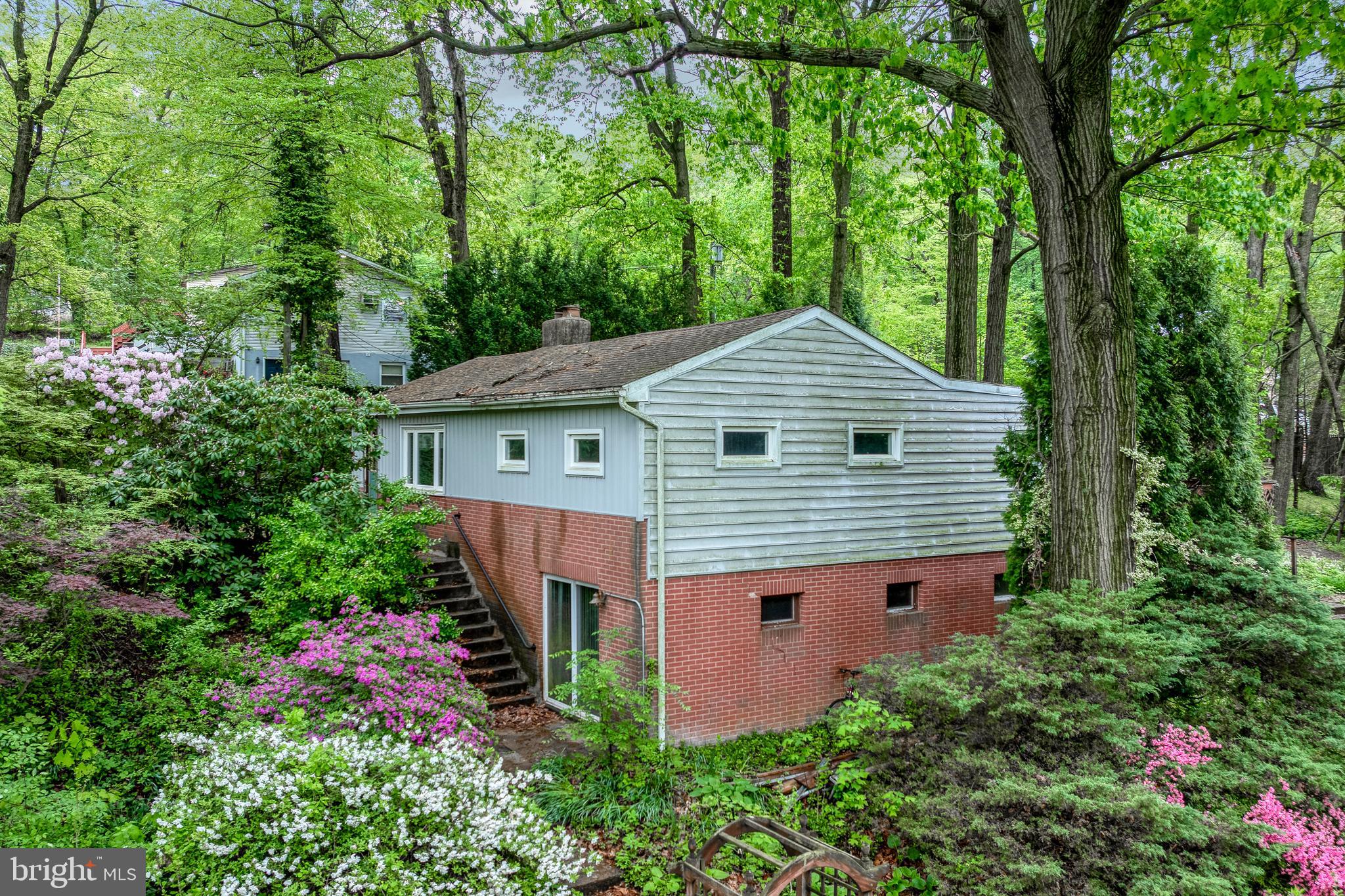 Upcoming auction, this home will be offered for sale, live and in person at the property on Thursday June 5th at 5:30 PM. Tucked away on a private 1.18-acre wooded lot, this 3-bedroom, 2.5-bath home offers peace, privacy, and endless potential. Enjoy nature from the expansive deck, perfect for entertaining or relaxing in the serene surroundings. This home is in need of repairs and updates. an ideal project for investors or buyers looking to create their dream home. Don't miss this unique opportunity to own a slice of countryside!