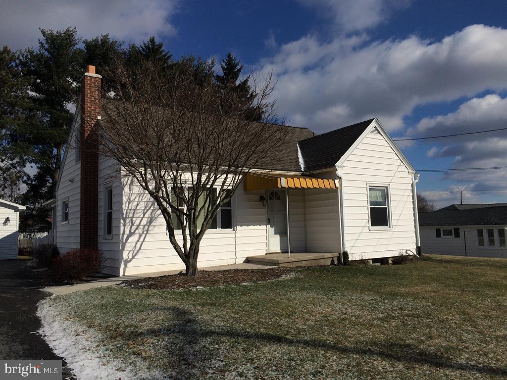 This remarkable cozy home would be perfect for the empty nester, retiree or first time home buyer. This home features a newer roof, windows, and 2 car garage. In addition, the whole home had an all new face lift with new paint, flooring, and custom blinds. This gorgeous Maple "Lukens Custom Kitchen" is the cherry on the top with the soft close drawers and doors, stainless appliances, granite counters and subway back splash. Located in the basement is newer washer and dryer that are also included along with a storage shed in the private back yard. The options are endless with the walk up attic that could easily be transformed into a third bedroom, family room or just keep it as storage. The location is as unique as the house in the quaint little neighborhood less than 30 minute commute to State College.