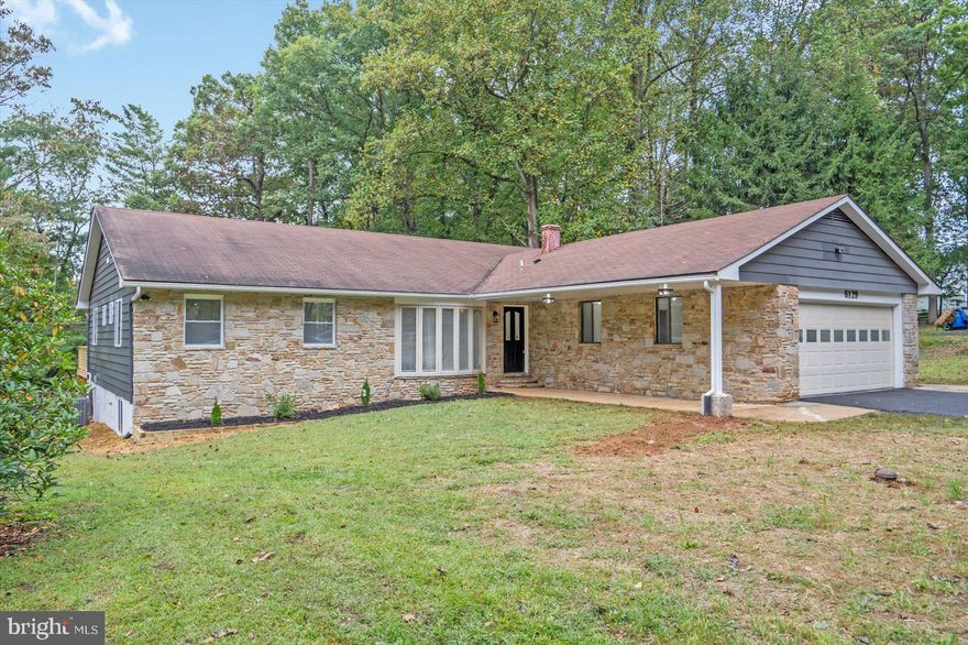 Welcome to this updated  5 BR/3.5 BA rancher. Gorgeous private fenced in lot in a highly desirable community. Walk in and fall in love with the attention to detail throughout the home. Formal dining area with tons of natural light. The hallway leads to an open floor concept. As you approach the large living room, a custom dry bar area with a wine fridge and a bamboo accent wall. Living room has a beautiful stone wall and an electric fireplace. Walkout to a spacious deck area that overlooks the enclosed large yard. Off the living room is an additional large room , perfect for a sitting area, office or dining space.  The Kitchen has its own breakfast area, island, quartz counter tops, SS appliances, and custom extra cabinet space. There are 3 bedrooms and 2.5 bathrooms on the main level. The basement has 2 additional bedrooms and  1 full bathroom. First floor Laundry.  Basement has access to a finished storage area.