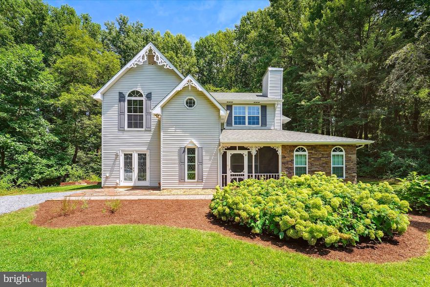 BEAUTIFUL COLONIAL HOME WITH GREAT  ON 3 PRIVATE ACRES **  You Will Love This Home!!! Very Well Maintained & Updated Recently!    Cozy Screened-In Front Porch  where you can Sit, Relax & drink your Coffee or Wine!  This Beautiful Home Features an Open Floor Plan, has been Freshly Painted, New Carpeting, Lots of Upgrades throughout!!! The Entrance Foyer has Marble Tile Flooring & Coat Closet * Spacious Living Room with Wood Floor &  Wood Burning Fireplace w/Beautiful Antique Wood Mantel * Upgraded Gourmet Kitchen in 2015 with Maple Cabinets, Wine Glass Holder Under the Cabinets, Cabinet w/Built-in-Spice Rack, Granite Countertops with Tile Backsplash, Upgraded Stainless Steel Appliances, Gas Cooktop, Island w/Wine Fridge, Breakfast Area w/Built-in-Seating, Ceramic Tile Flooring, Pantry & Bay Window  * Separate Dining Room with Wood Flooring, Fancy Trim & Bay Window * Family Room has a Fireplace with Beautiful Antique Wood Mantel, Wood Flooring & French Door to the Front Yard Patio  * Updated Powder Room with Granite, Modern Sink, New Cabinet, Ceramic Tile Flooring * Storage/Utility Room has a Freezer & Door to Back Yard * 4th Bedroom or could be Office/Den with Built-In-Cabinets, Granite Countertops, Ceiling Fan w/Light, Custom Blinds w/Remote, Fujitsu AC/Heat Wall Unit & 2 Closets *** THE UPPER LEVEL FEATURES Hallway with Wood Flooring & Attic Access * Primary Bedroom has a Vaulted Ceiling, Palladium Windows, Ceiling Fan w/Light & Beautiful Updated Primary Bathroom with Granite, Ceramic Tile Shower, Spacious Walk-in-Closet, Ceramic Tile Flooring * The 2nd Bedroom has a Ceiling Fan w/Light plus a Beautiful Attached Sitting/Sun Room with a French Door separating the bedroom, Built-in-Safe (behind picture), Skylight, Ceiling Fan w/Light, Palladium Windows & access to the Upper Level Screened-In-Porch * The 3rd Bedroom has an Extra Large Storage Closet * Updated Hall Bath with Granite Countertop, Beautiful Cabinet, Shower Door * Upper Level Washer & Dryer * Two Screened-In-Porches off the Back of House/Upper and Lower Level with Trex Deck & Ceiling Fans with Lights * Shed * Gutter Guards *  Updates Include newer: Roof, Heat Pump, Windows, Kitchens, Baths, Carpet, some Insulation in the Attic & more * Absolutely Beautiful Home!!!  Conveniently located to Shopping, Chesapeake Bay Boardwalk/Restaurants/Water Park.  Conveniently located to Annapolis, Washington DC, Andrews AFB, BWI & so much more!  Covenants but No HOA * Horses Permitted * Community Pond * Lots of Flowering Shrubs & Trees which includes Magnolias, Crepe Myrtles, Pear Tree, Holly Tree, Maple Tree, Perennials, Hydrangeas, Herb Garden, & a Private Back Yard with a Fishpond!