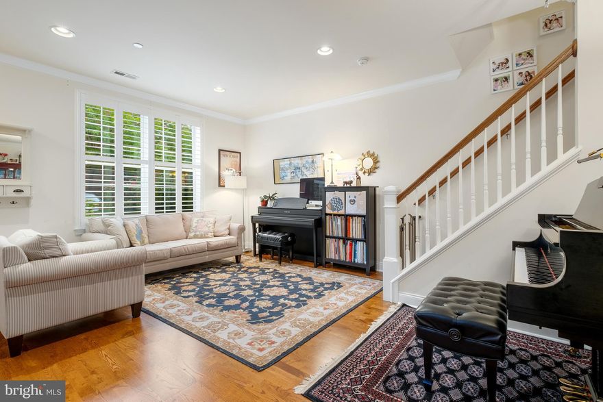 Exceptional Naval Square opportunity: Enjoy all the square footage of an upper level townhome- but without the stairs! TWO YEAR LEASE PREFERRED. You will love this expanded LOWER level townhome with private entrance & PARKING! First floor features an open living/dining space, discreet 1/2 bath, and spectacular custom kitchen with stainless appliances & granite countertops. The kitchen opens to an adjoining family room and covered terrace. Enjoy two large storage closets & one coat closet on this level of the home. Second floor features a sunny owner's suite with an oversized walk-in-closet completely outfitted with California Closets. Luxe en-suite bath has dual sinks, upgraded tile, soaking tub & separate stall shower. Two additional bedrooms open to an additional terrace spanning the entire length of the home.  Laundry closet with newer LG side-by-side washer/dryer & shared hall bath complete the 2nd level. Beautiful plantation shutters and upgraded lighting throughout. Deeded parking space #380 is located just steps from the home. Enjoy the ease of having the seasonal pool & state-of-the-art fitness center only steps from your home and the concierge close by. The dramatic community room in Biddle Hall rotunda is perfect to reserve for private parties. Enjoy the outdoor amenities of the 20-acre park-like setting: including, picnic areas, well-kept gardens & mature landscaping. 24-hour secure, gated community. Very close proximity to South Street Bridge, UPenn (0.7 mi), CHOP, HUP & Drexel, Rittenhouse (0.9 mi) & Fitler Square. Exciting restaurants, shops and cafes, including the brand new Heirloom Market by Giant are all just steps outside the gates. Directly out the back gate you can enjoy the Schuylkill River Park, including the Award Winning Trail & Boardwalk, Markward playground & tennis courts! Do not miss your chance to live in Center City's premier gated community! No pets please.